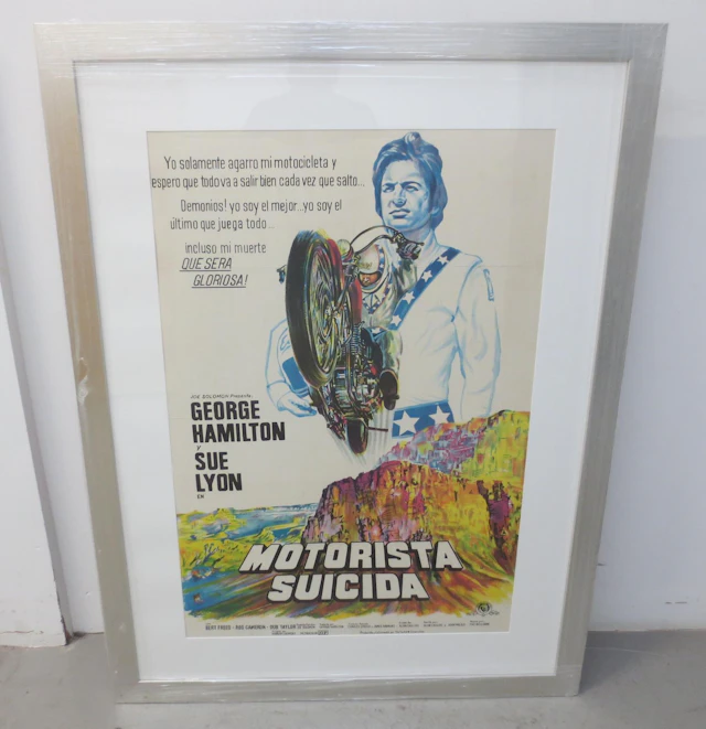 Six framed motorcycle themed film posters,