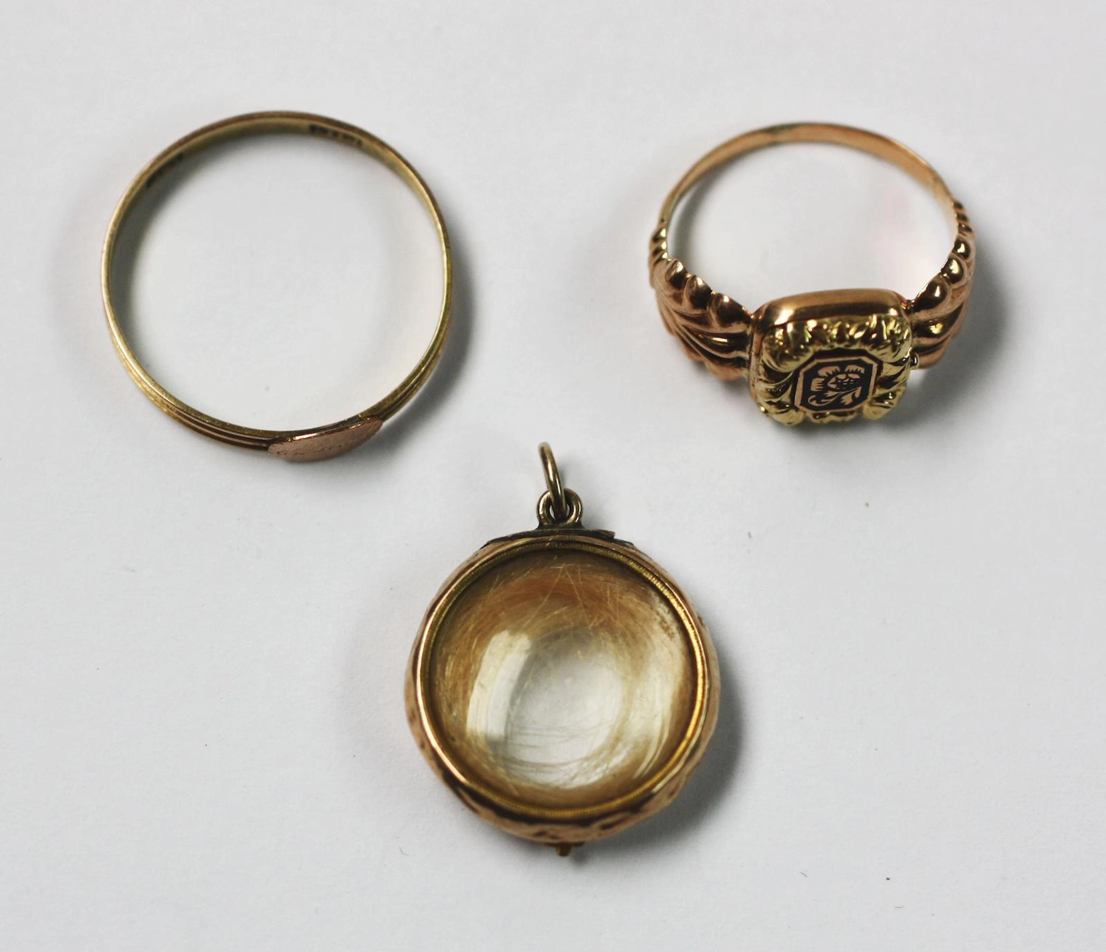Two rings and a locket, (3)