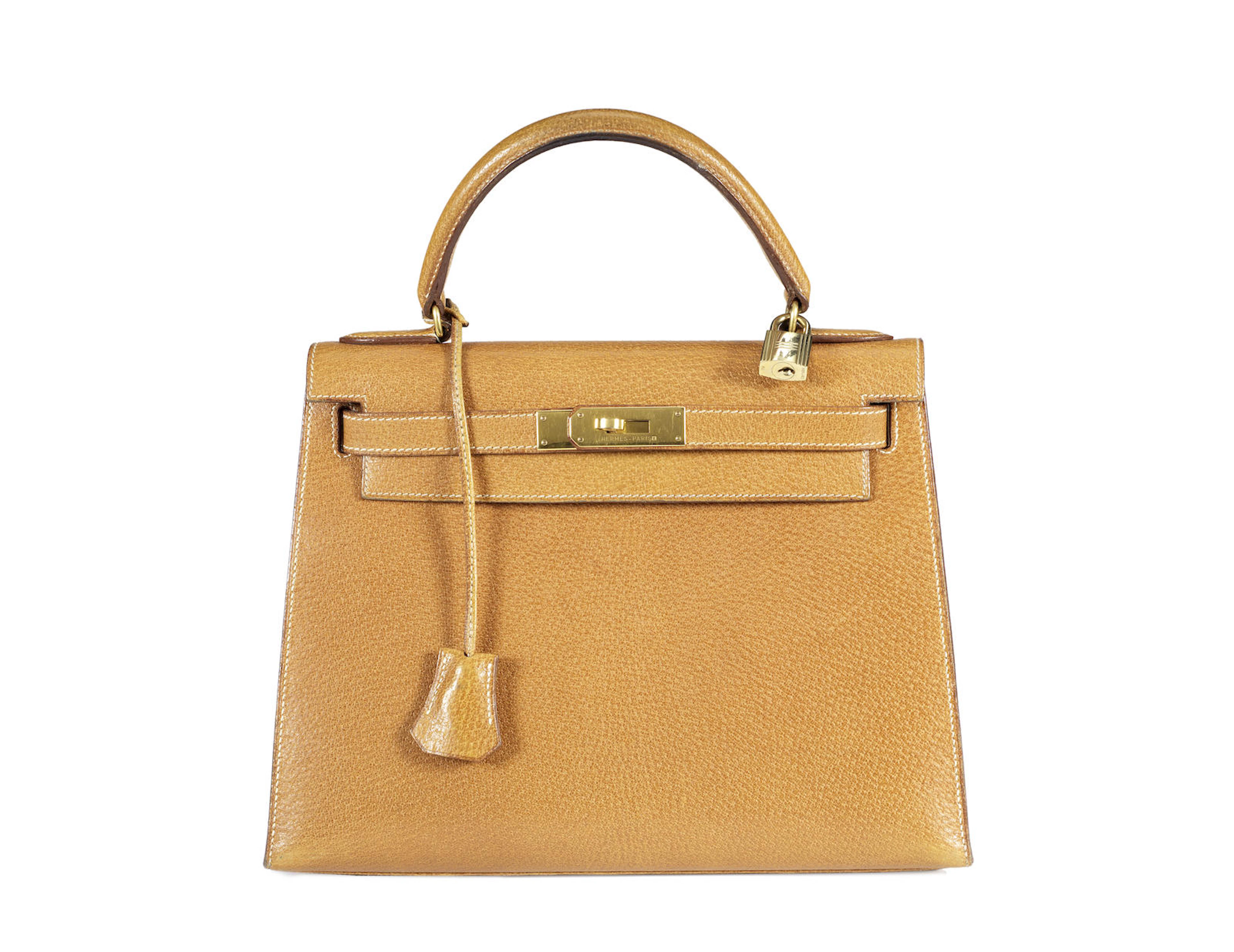 A Hermès tan togo leather Kelly bag with white stitching, 1994