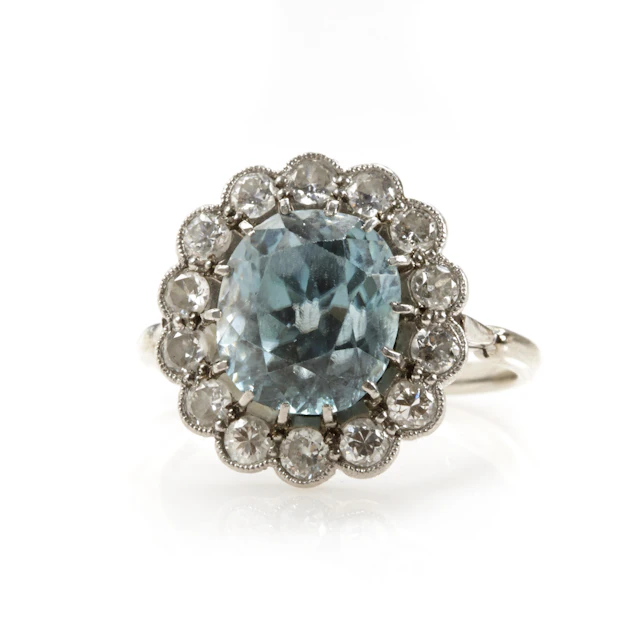 A blue zircon and diamond ring