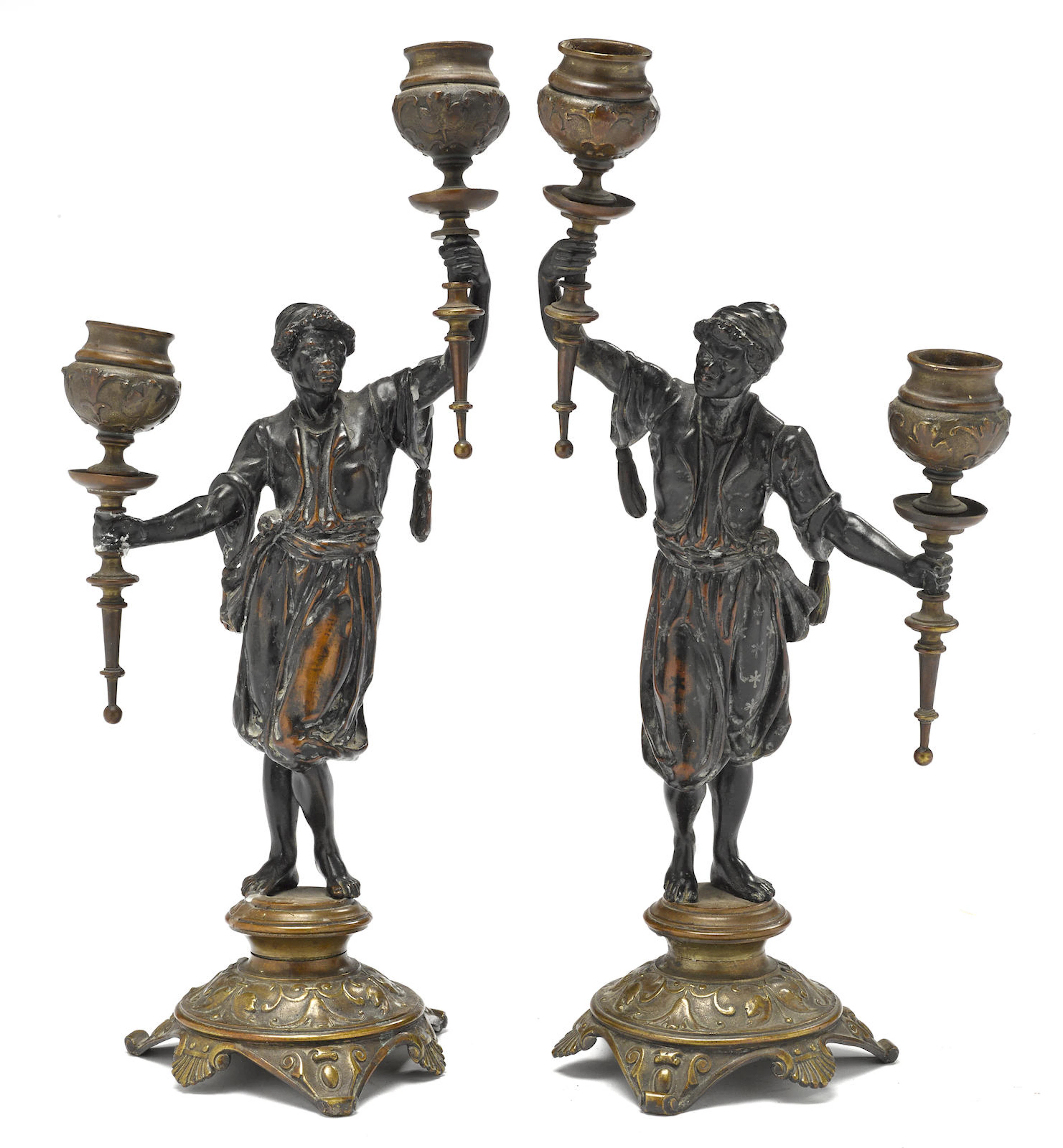 A pair of French Aesthetic patinated bronze figural two light candelabra fourth quarter 19th century