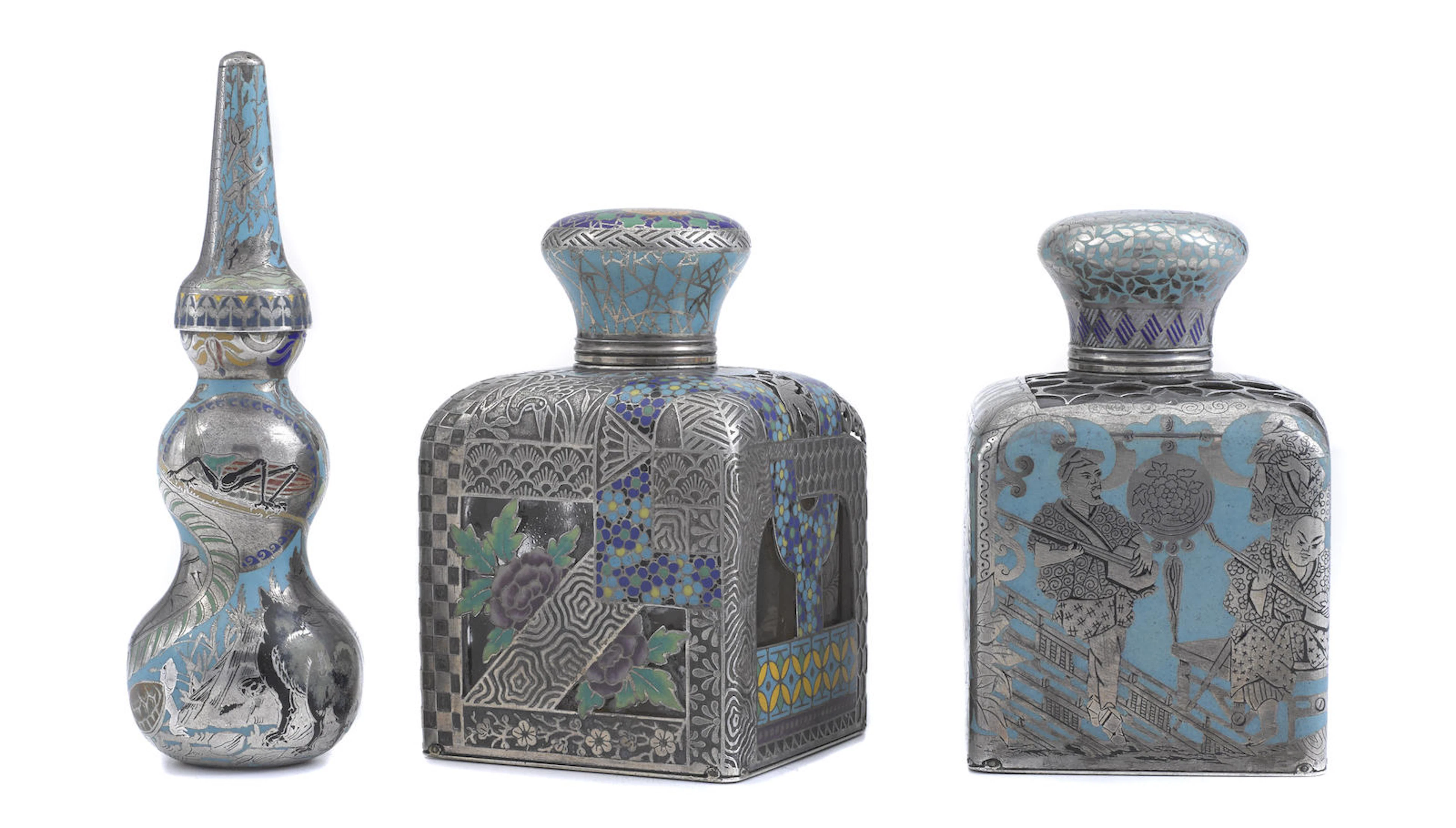 Three French first standard silver, cloisonné enamel and glass Aesthetic Movement scent bottles possibly designed by Paul Legrand, maker's marks illegible, retailed by Frédéric Boucheron, Paris