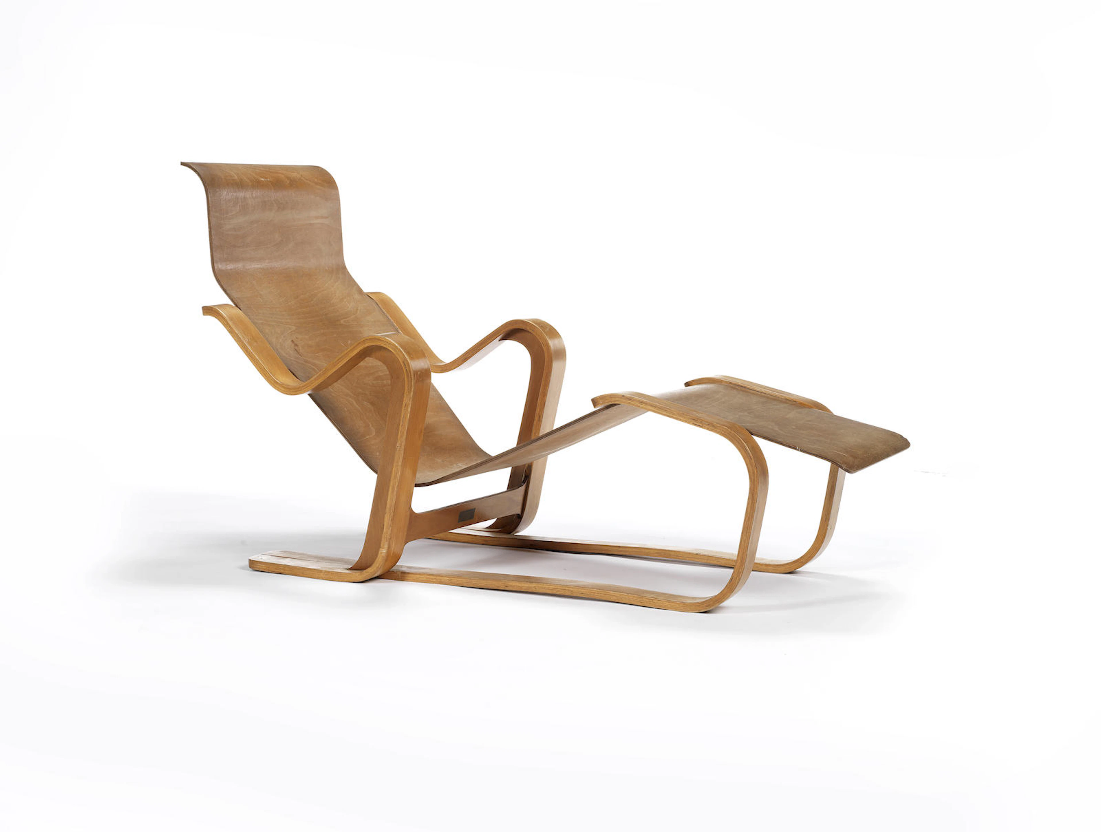 Marcel Breuer for Isokon Furniture Company A Long Chair circa 1936paper label for Isokon Furniture Co., London, Isokon Long Chairbirch faced moulded plywood Height: 77 cm. 29 1/2 in. Length: 140 cm. a