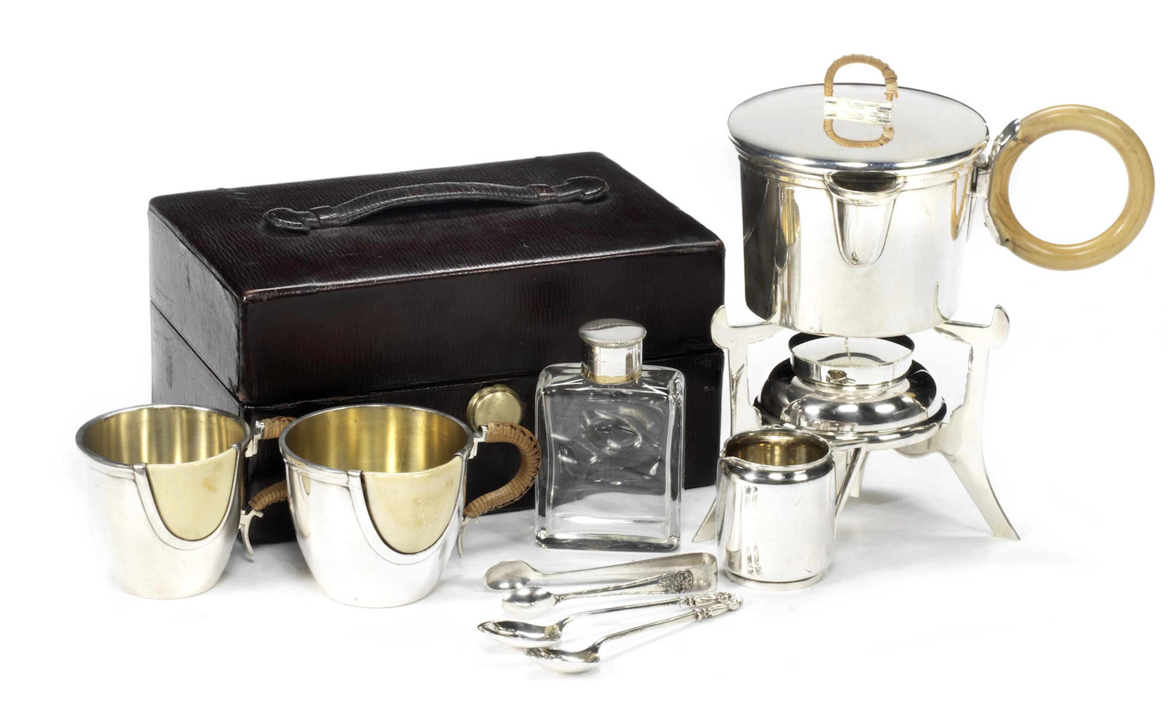 A fine leather-cased tea set for two persons, by Tonnel, 12 Rue de la Paix, Paris, c1909,