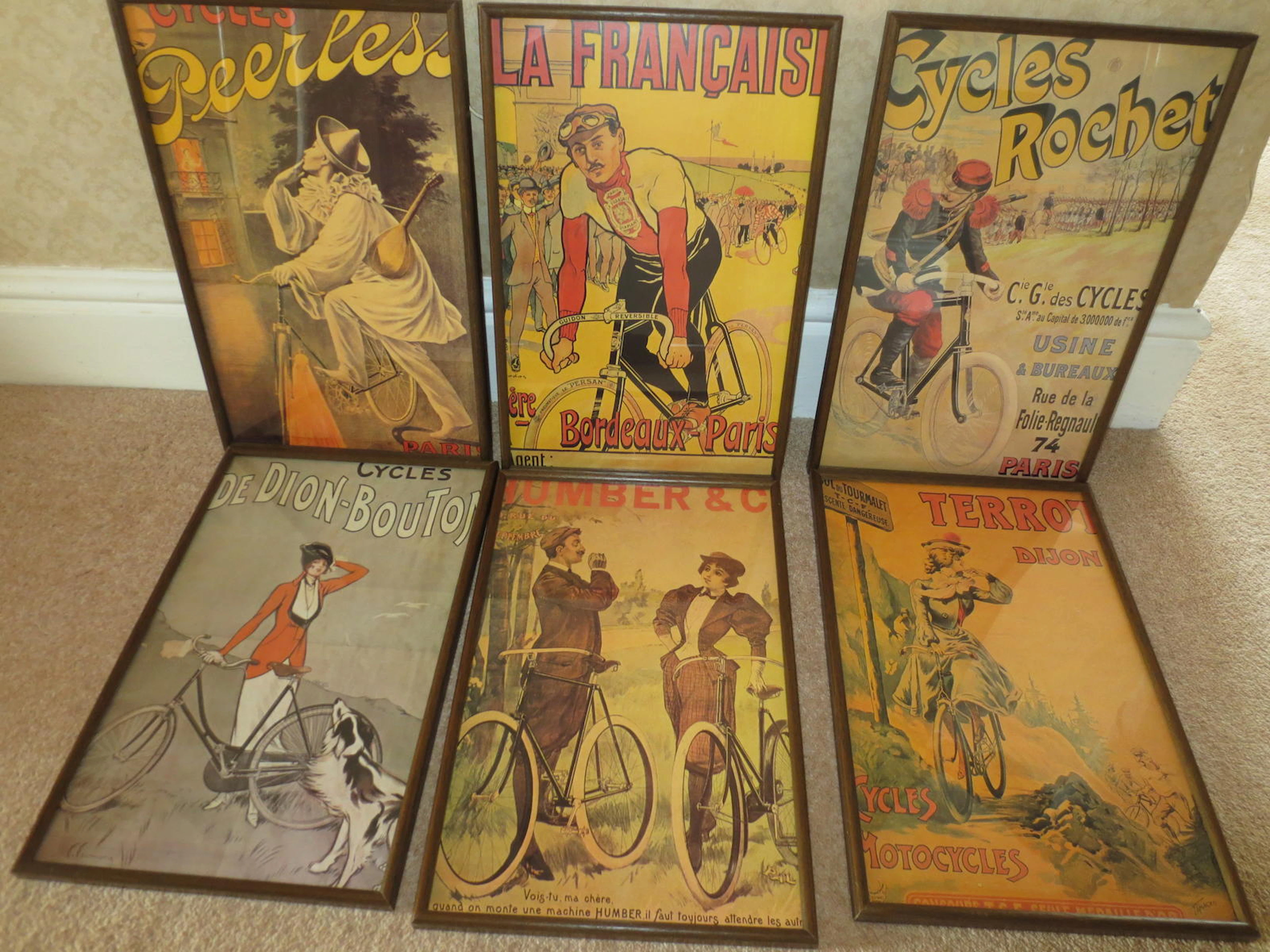Six modern reproductions of classic cycling posters,