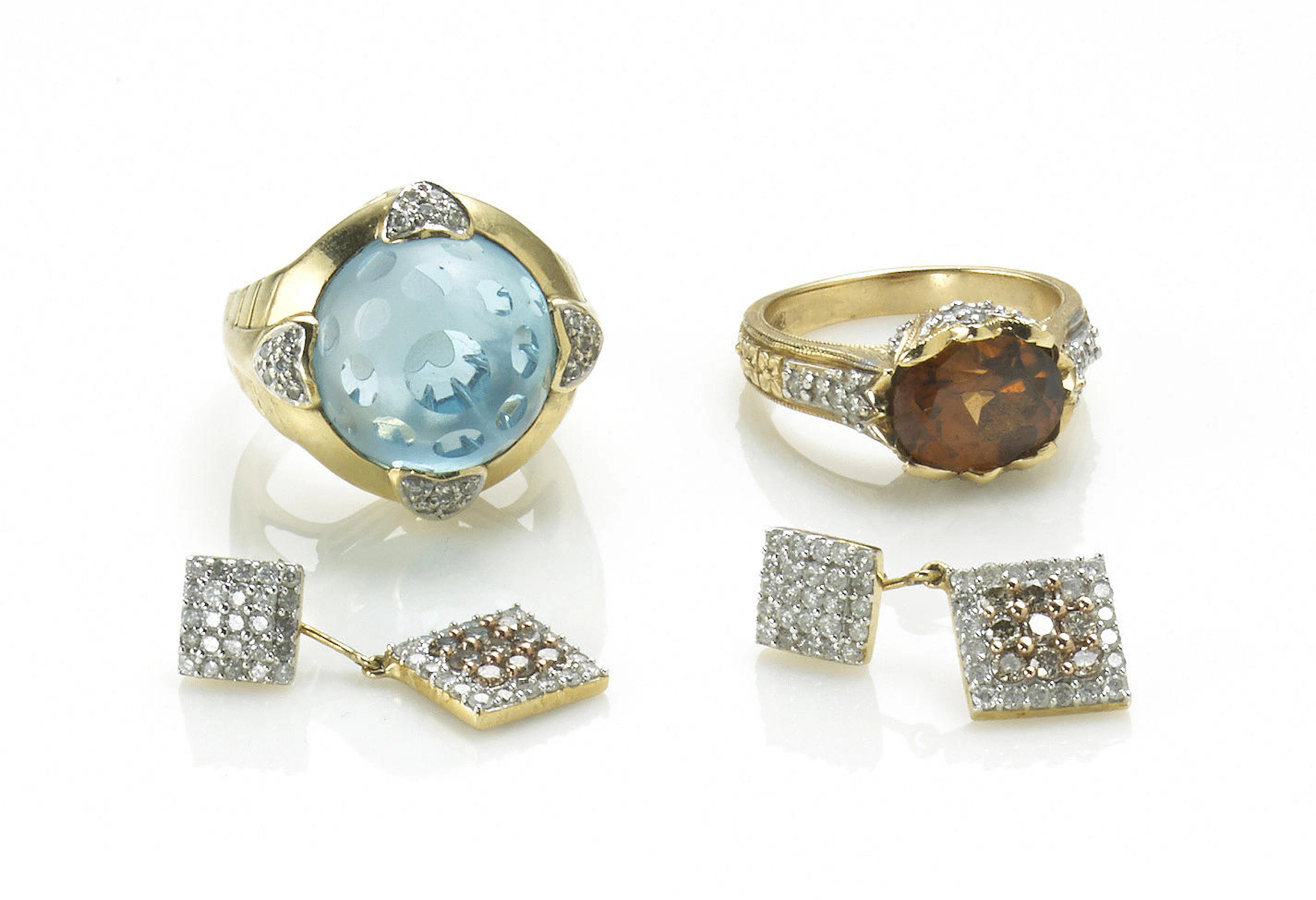Two gem-set and 14k gold rings together with a pair of colored diamond, diamond, 14k and 10k gold earrings