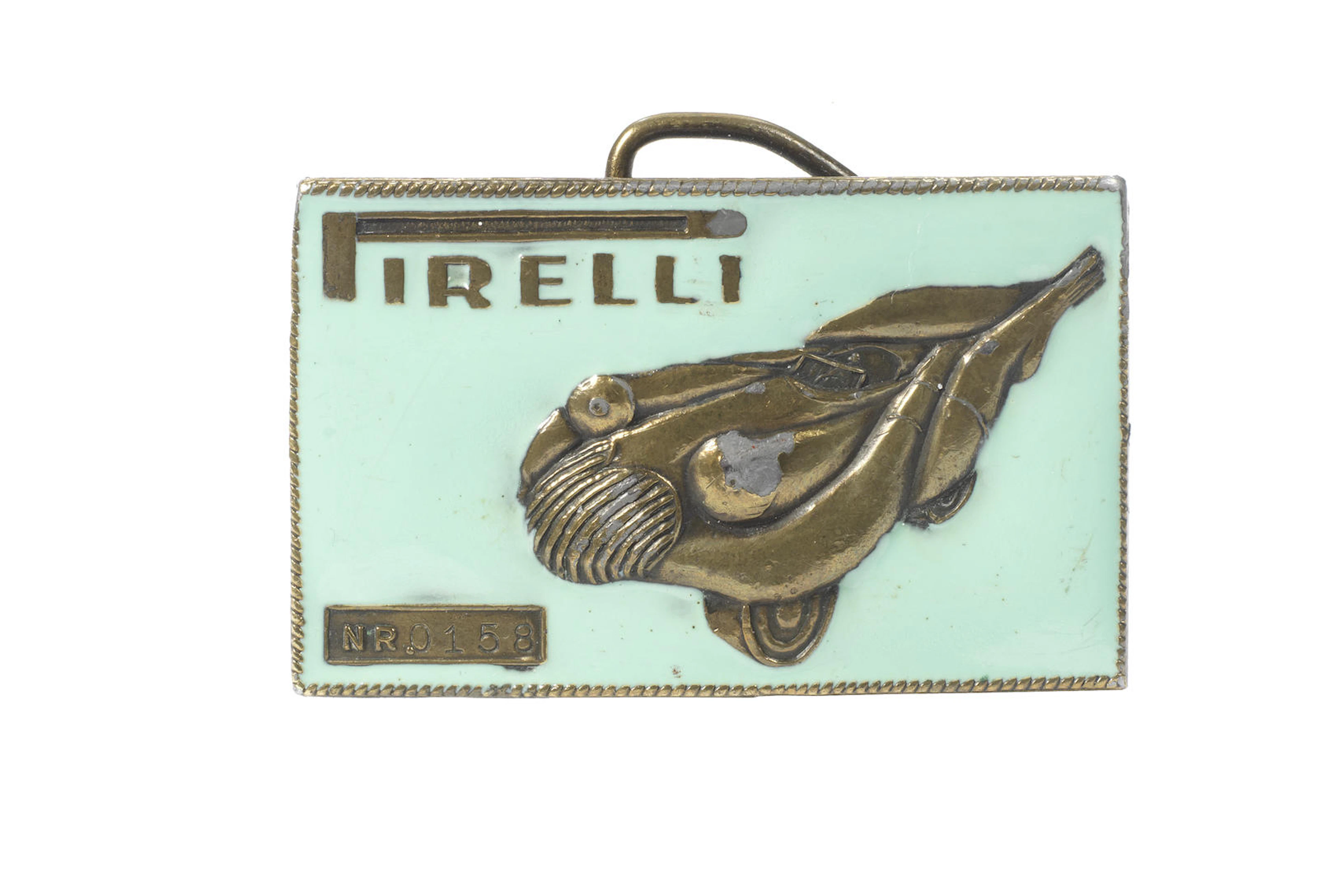 An erotic Pirelli belt buckle designed by Salvador Dali (1904-1989), Italian, for the American market, circa 1970,