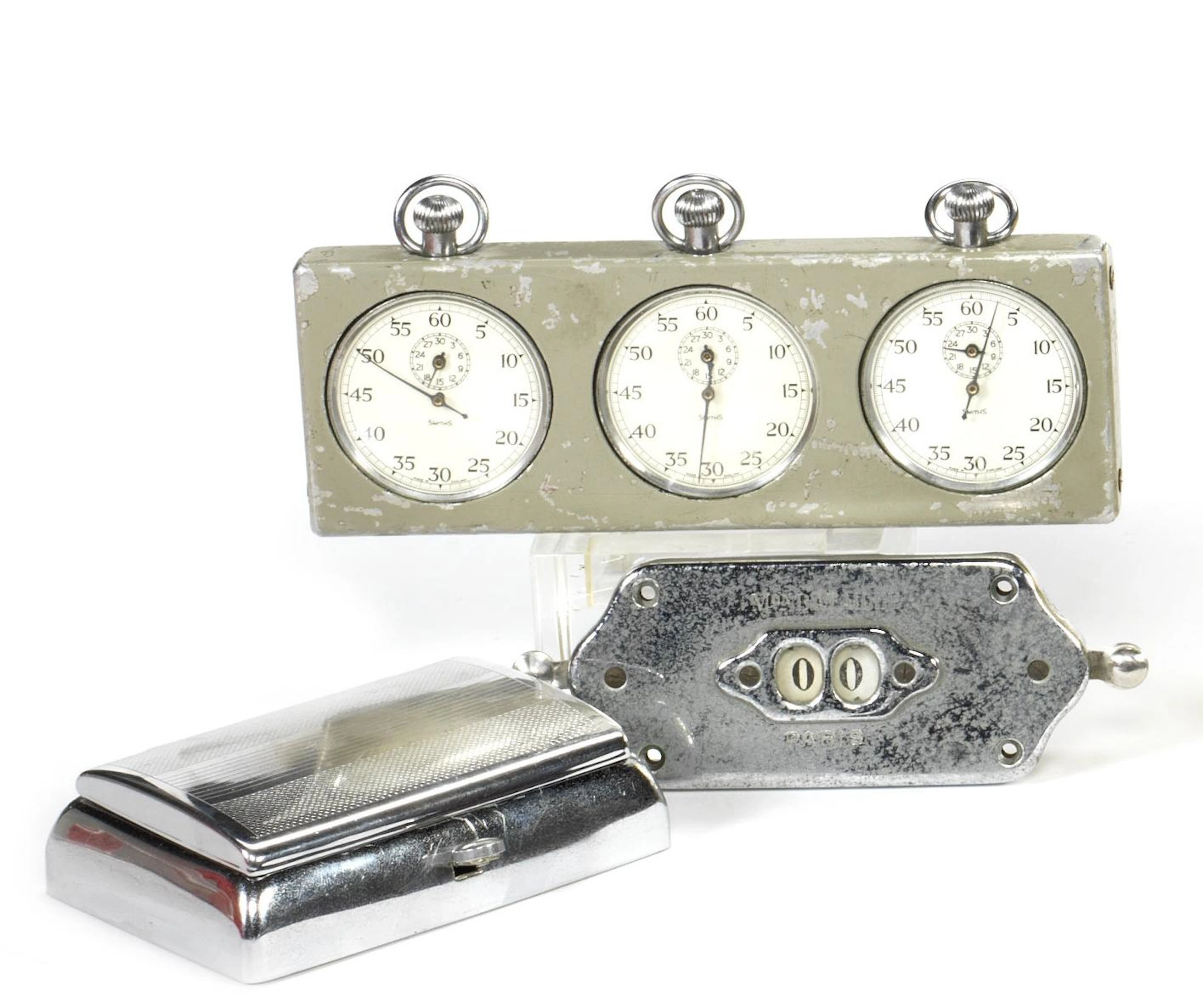 A set of three cased stopwatches by Smiths,