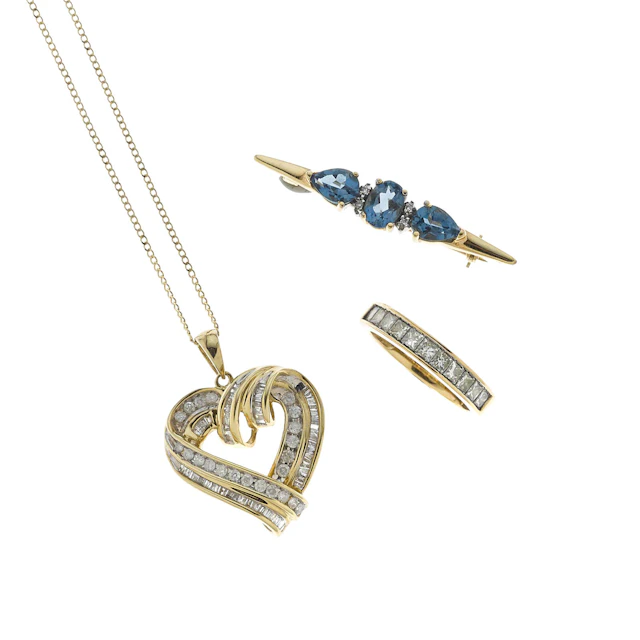 A collection of diamond, blue topaz and gold jewelry