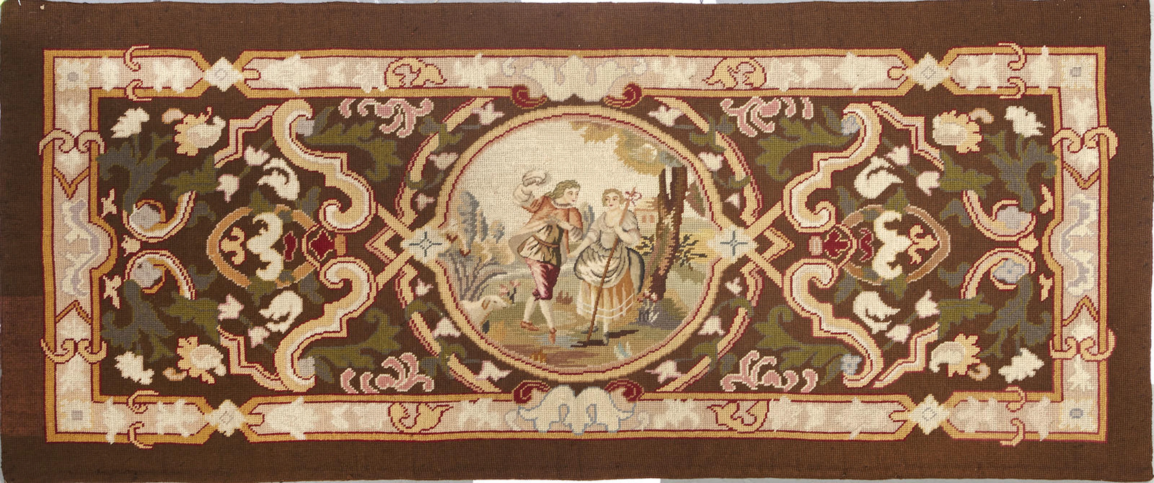 A European needlepoint rug size approximately 1ft. 11in. x 4ft. 4in.