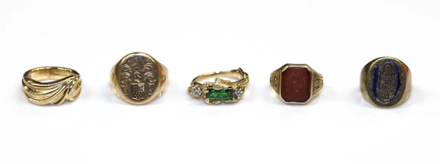 A collection of five gem-set, 14k and 10k gold rings
