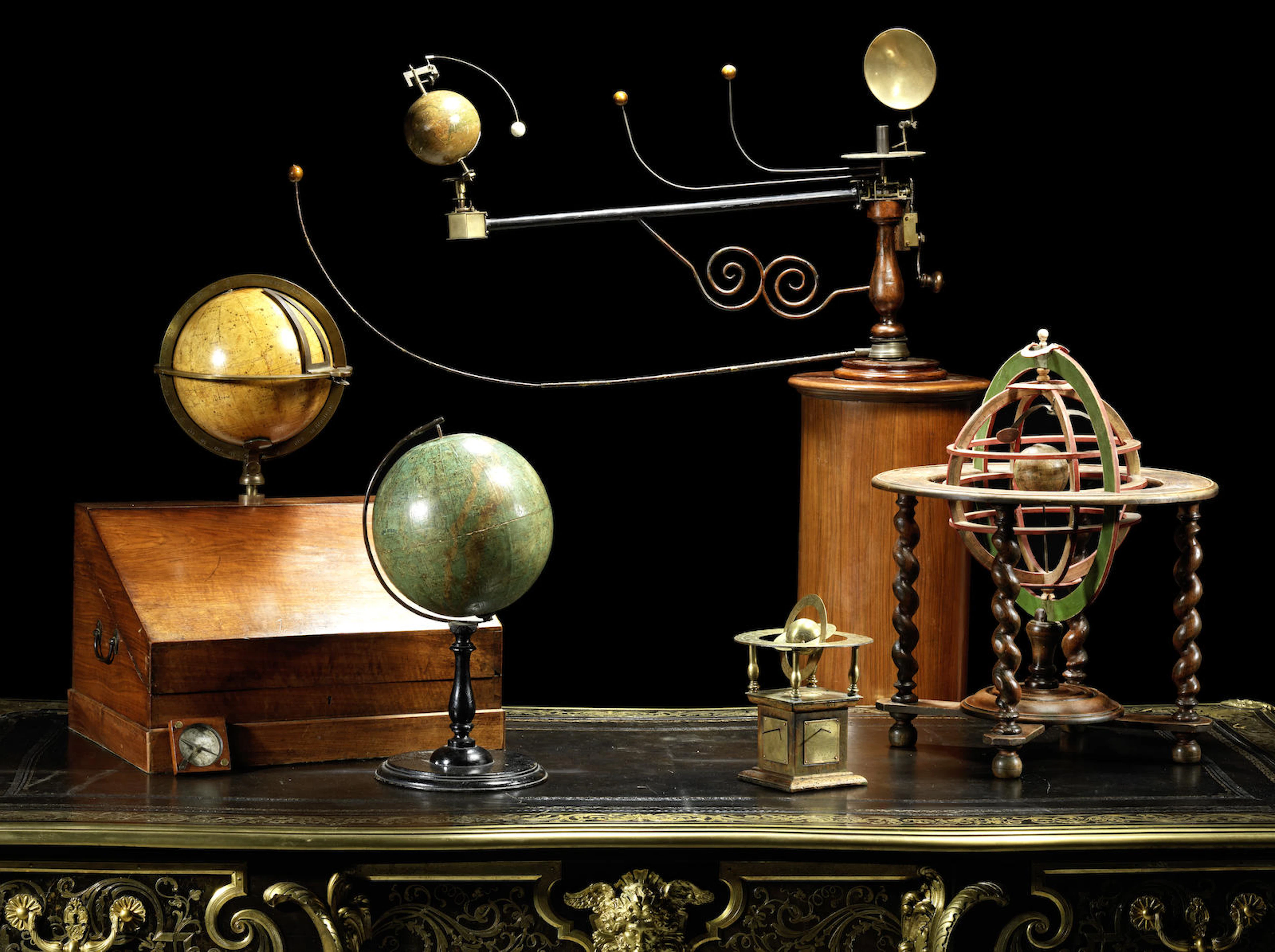 A French late 19th century papier mâché, bone, engraved paper and beech wood armillary table sphere in the manner of Charles-François Delamarche