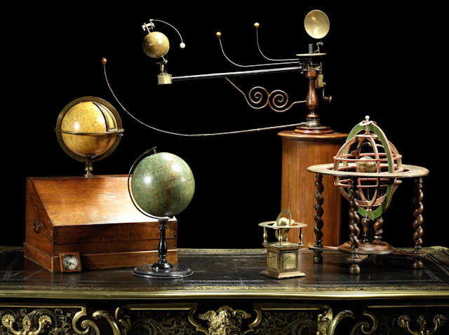 A French late 19th century papier mâché, bone, engraved paper and beech wood armillary table sphere in the manner of Charles-François Delamarche