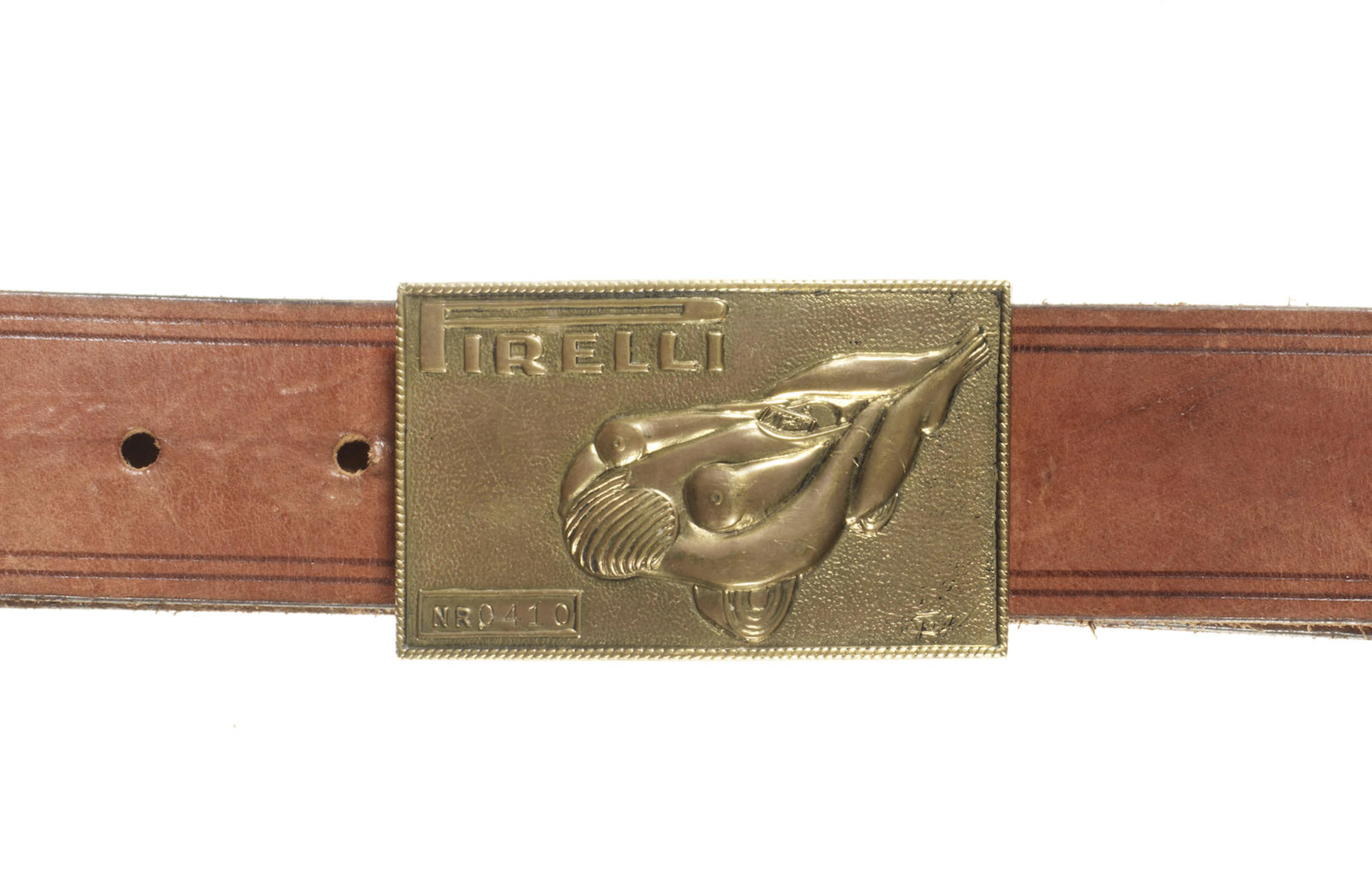 An erotic Pirelli belt buckle designed by Salvador Dali (1904-1989), Italian for the American market, circa 1970,