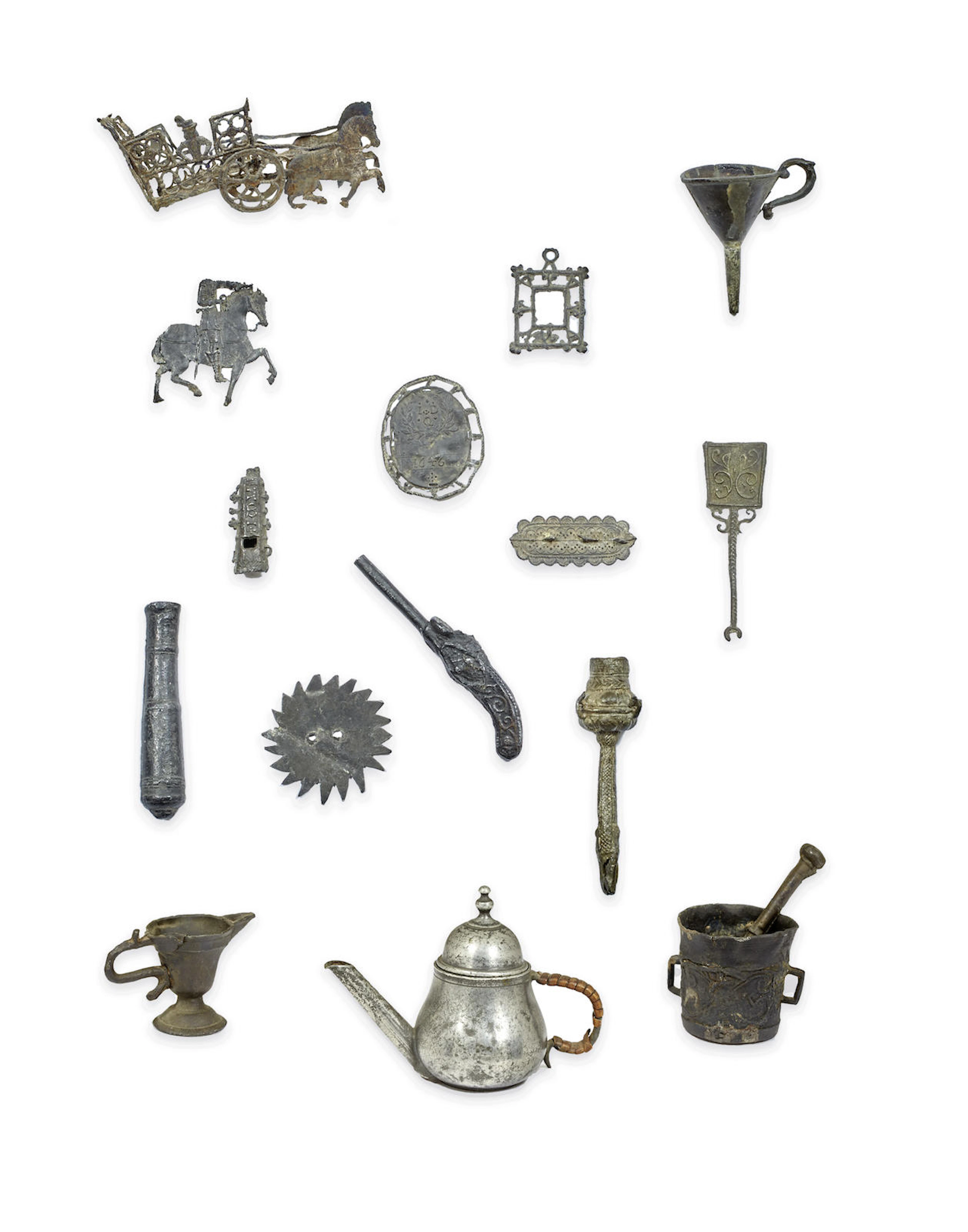 A fascinating group of fourteen pewter/lead-alloy toys, Dutch