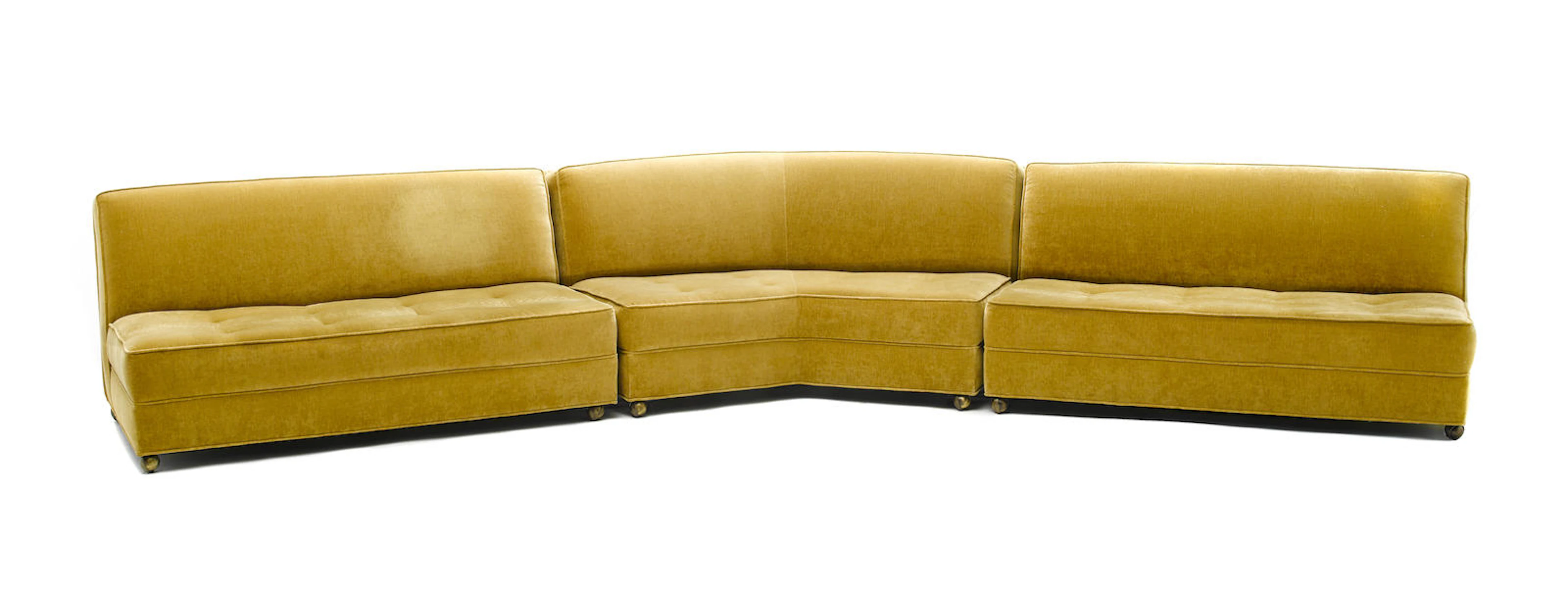 A Modern velour upholstered three-part sectional sofa circa 1970