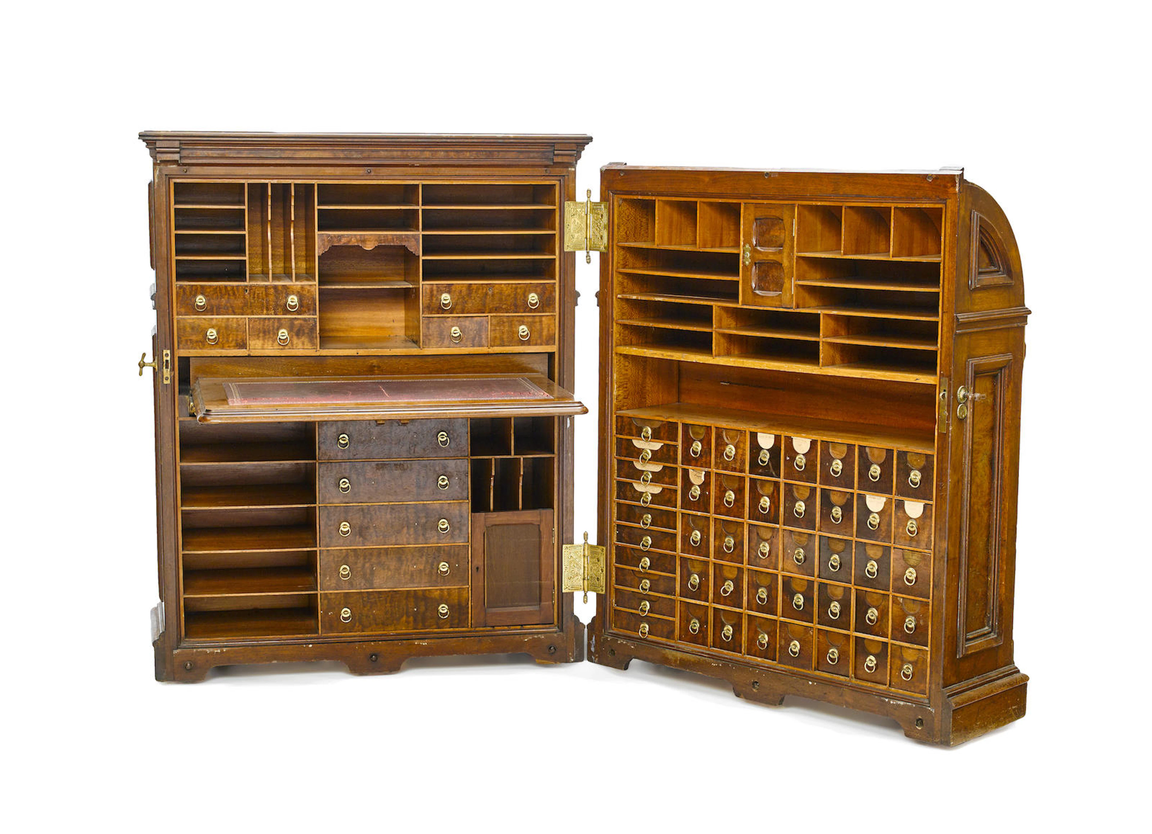 A Joseph Moore carved walnut "office Queen" rotary cabinet secretary second half 19th century