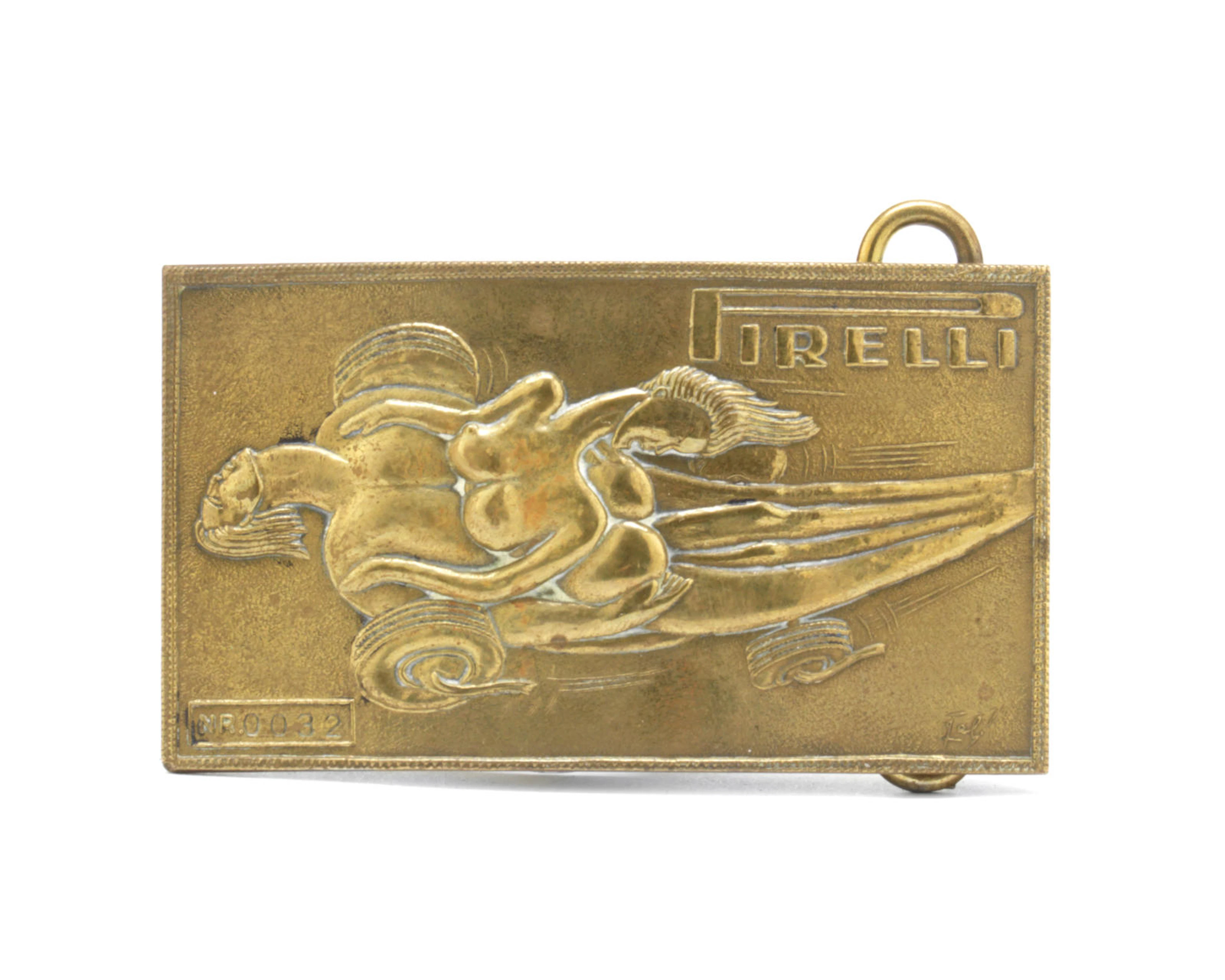 A rare Pirelli belt buckle designed by Salvador Dali (1904-1989), Italian for the North American market, circa 1970,