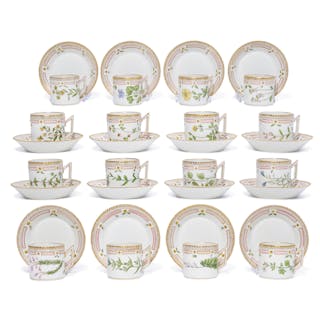 A set of twelve Royal Copenhagen porcelain Flora Danica cups and saucers and four demitasse cups and saucers date codes for 1969-79