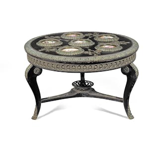 A French early 20th century ebony and ebonised low table...