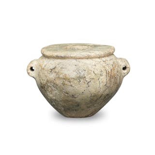 An Egyptian grey-green veined stone jar inscribed for the King's daughter
