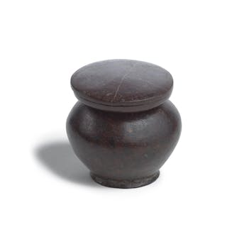 An Egyptian brown serpentine three-part kohl jar