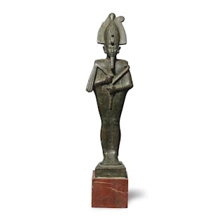 An Egyptian bronze figure of Osiris