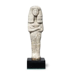 An Egyptian limestone shabti for the Lady of the House, Nakht-Mes