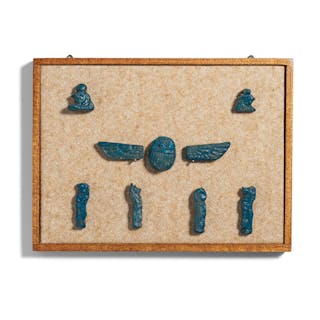 A framed group of Egyptian blue glazed faience amulets 9