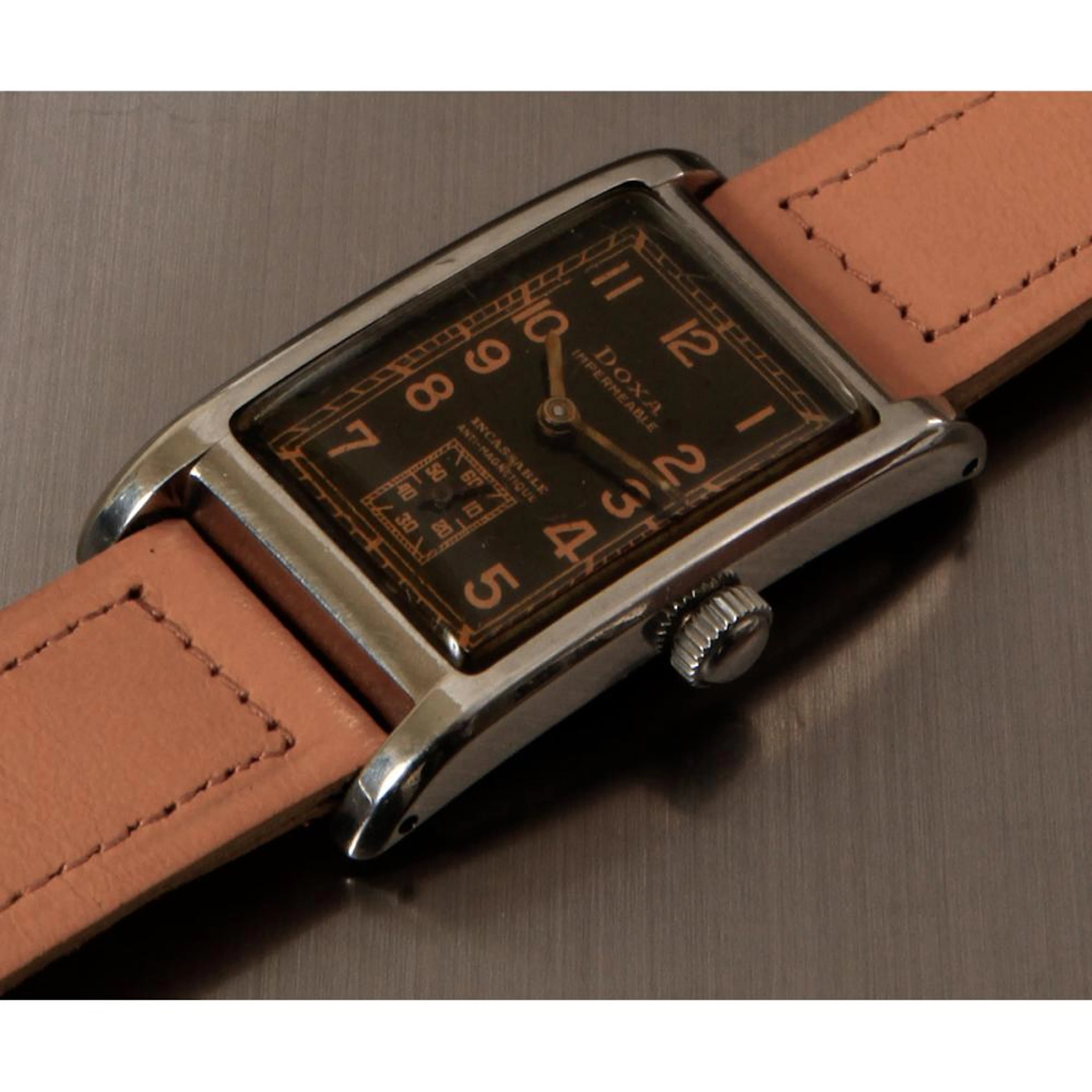 Doxa, Imperméable, n° 434xxxx, vers 1930. …