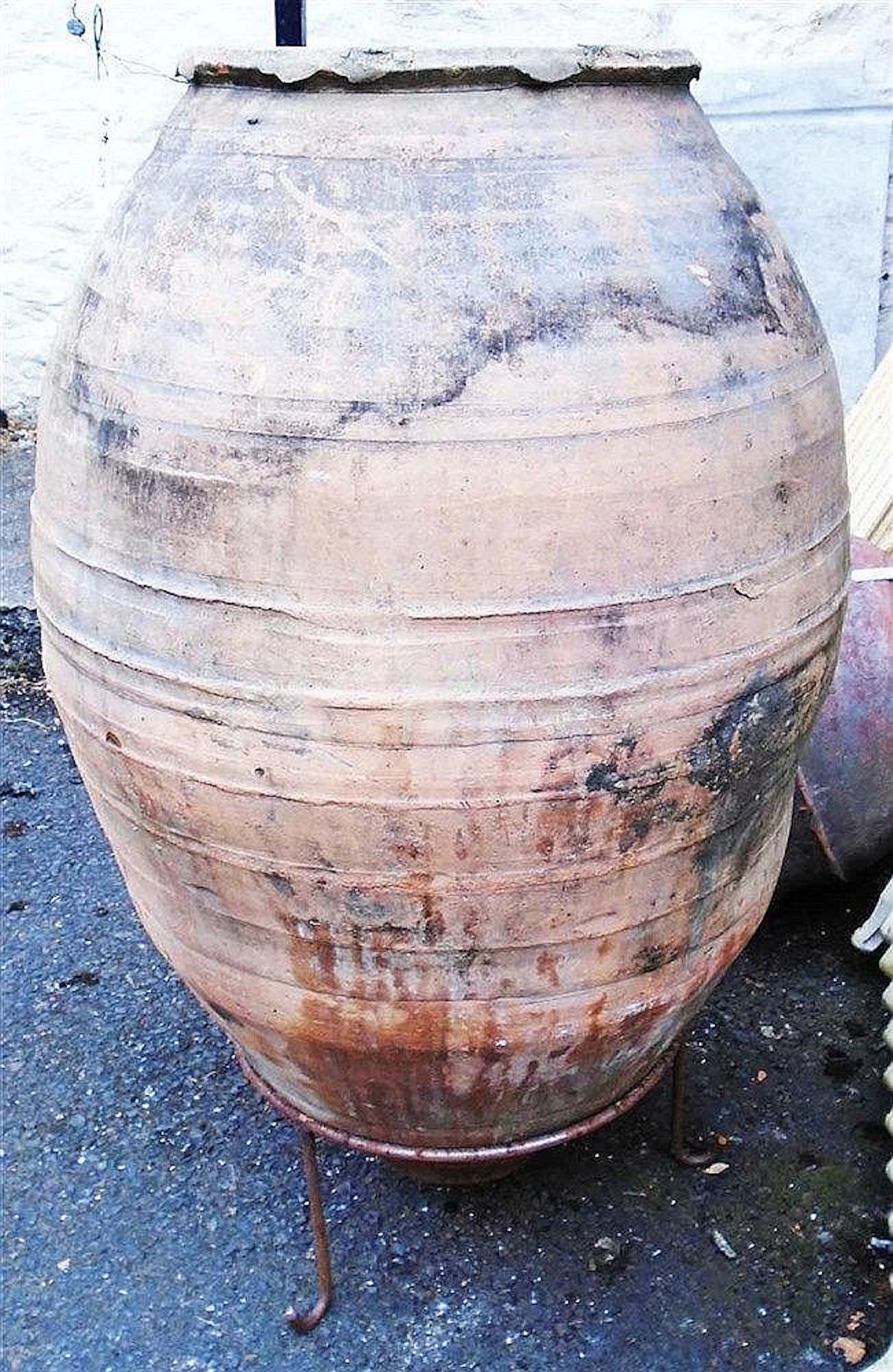 A 36" Turkish terracotta olive jar on stand