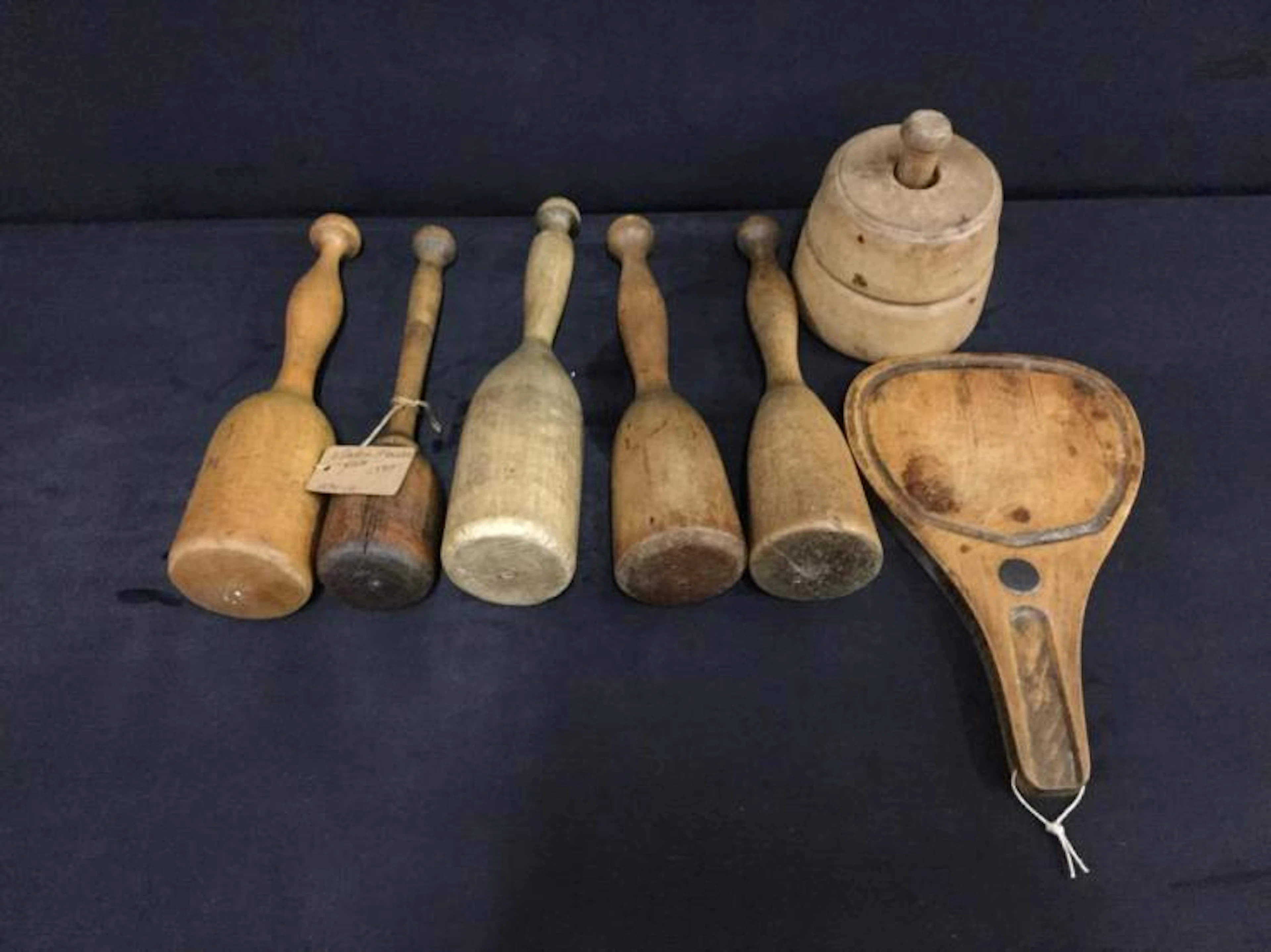 Selection of antique wooden kitchen tools incl. masher set
