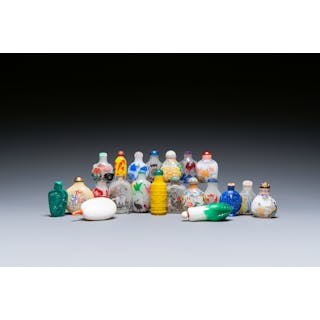 A varied collection of Chinese snuff bottles in glass, hardstone and