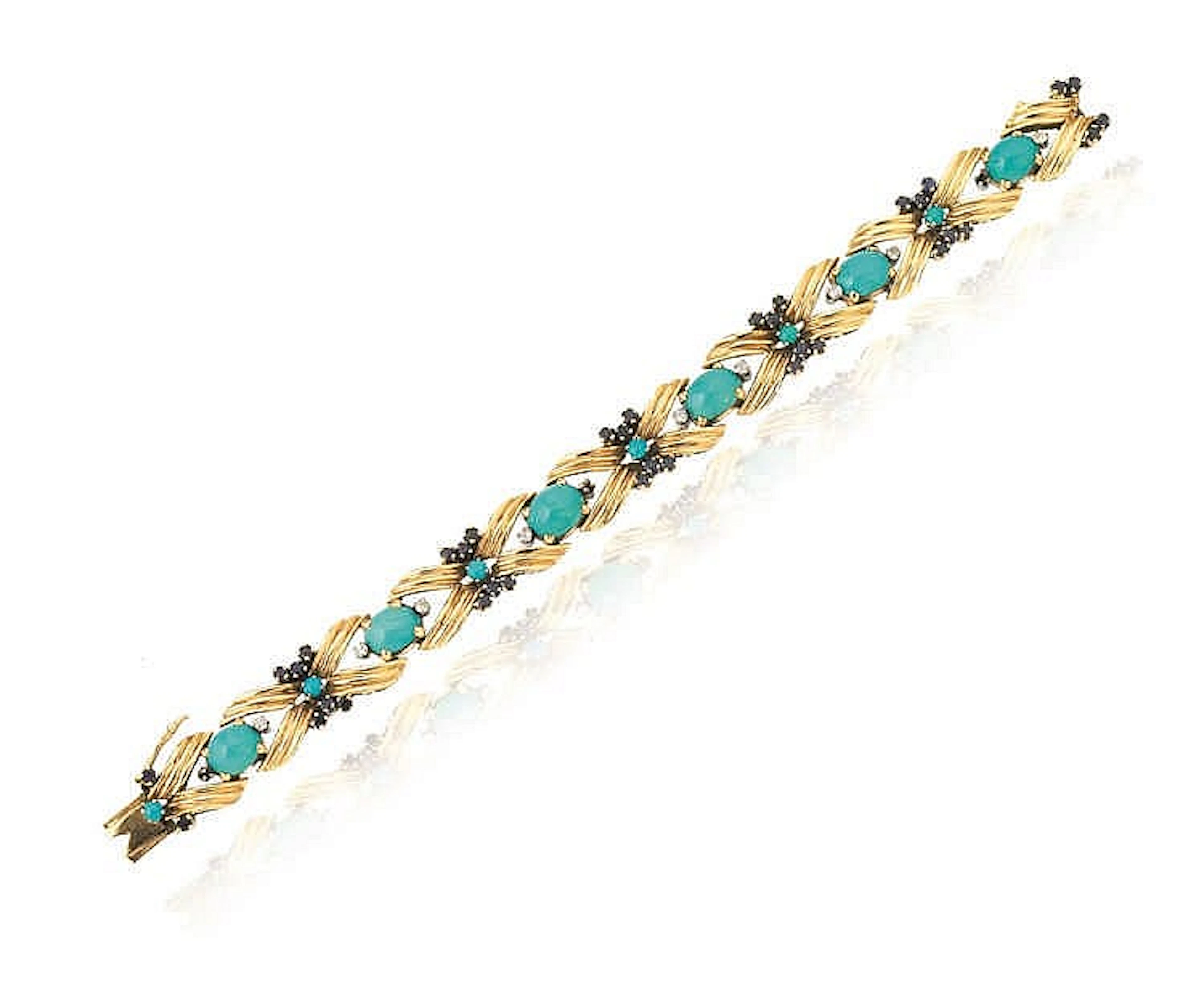 BRACCIALE IN ORO GIALLO, TURCHESE, ZAFFIRI E DIAMANTIad una fila di ele