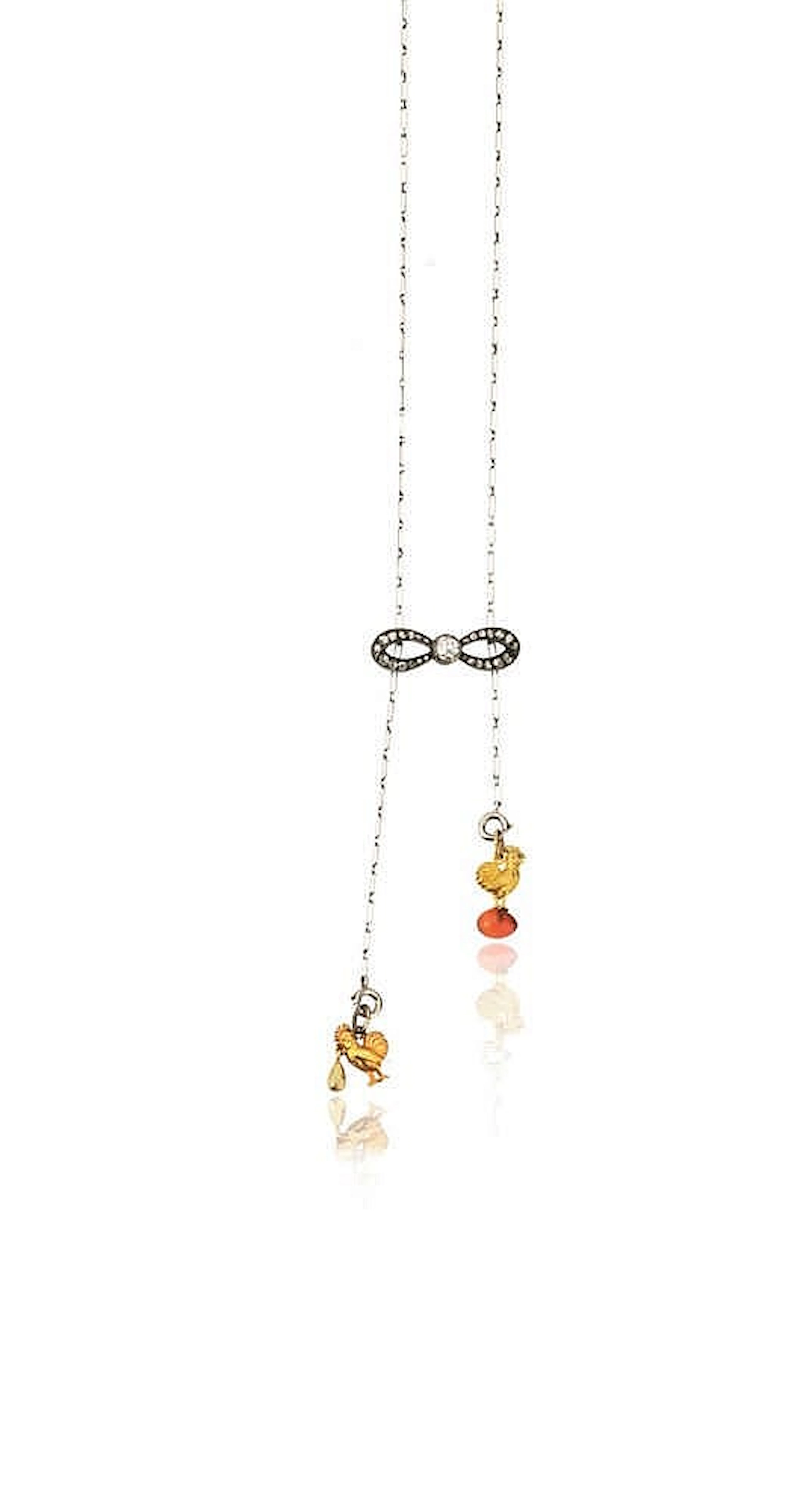 COLLANA IN PLATINO, ORO GIALLO, DIAMANTI E CORNIOLArealizzata ad un fil