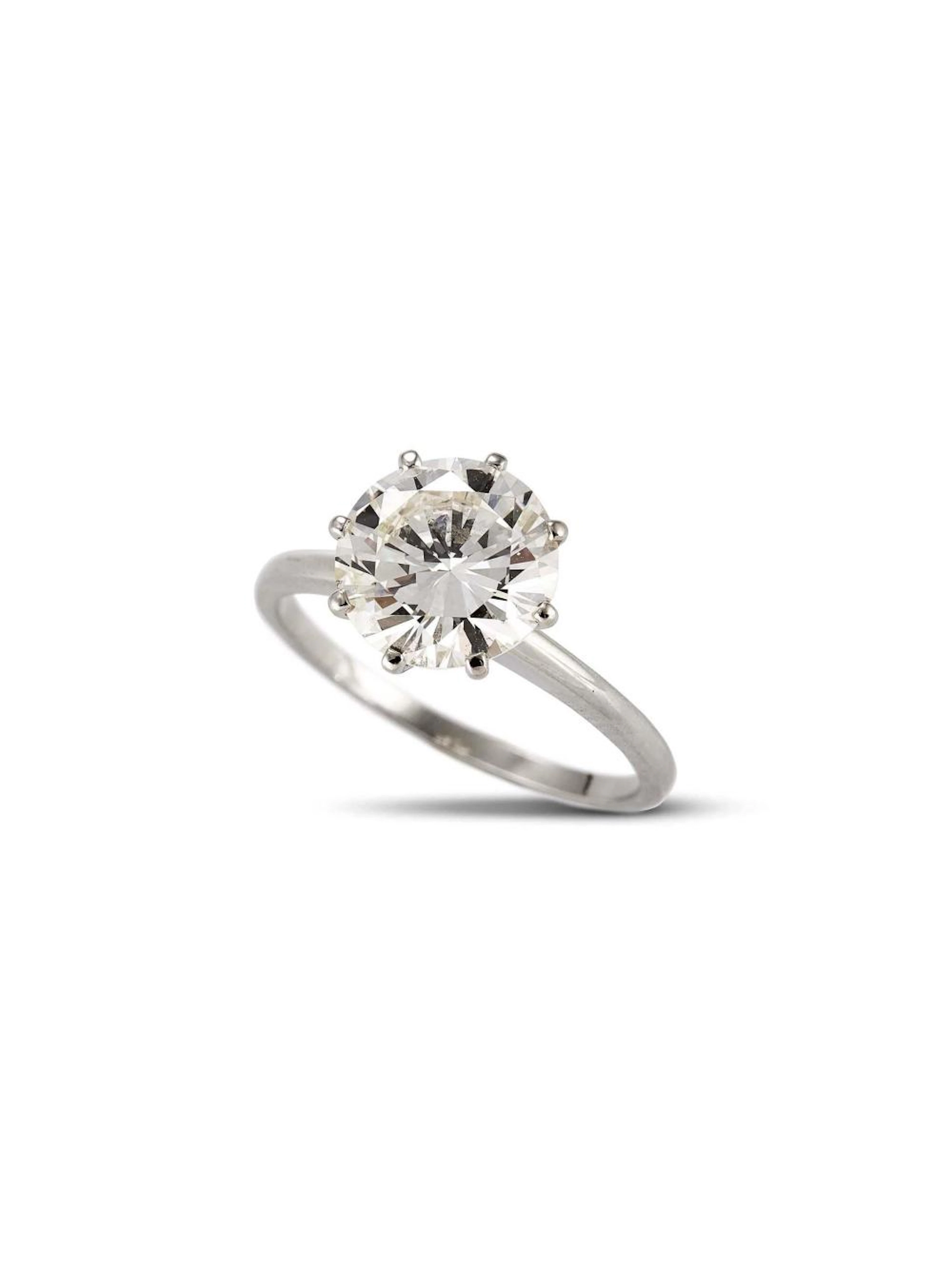 ANELLO SOLITARIO IN ORO BIANCO E DIAMANTE in oro bianco 18Kt, con al cen