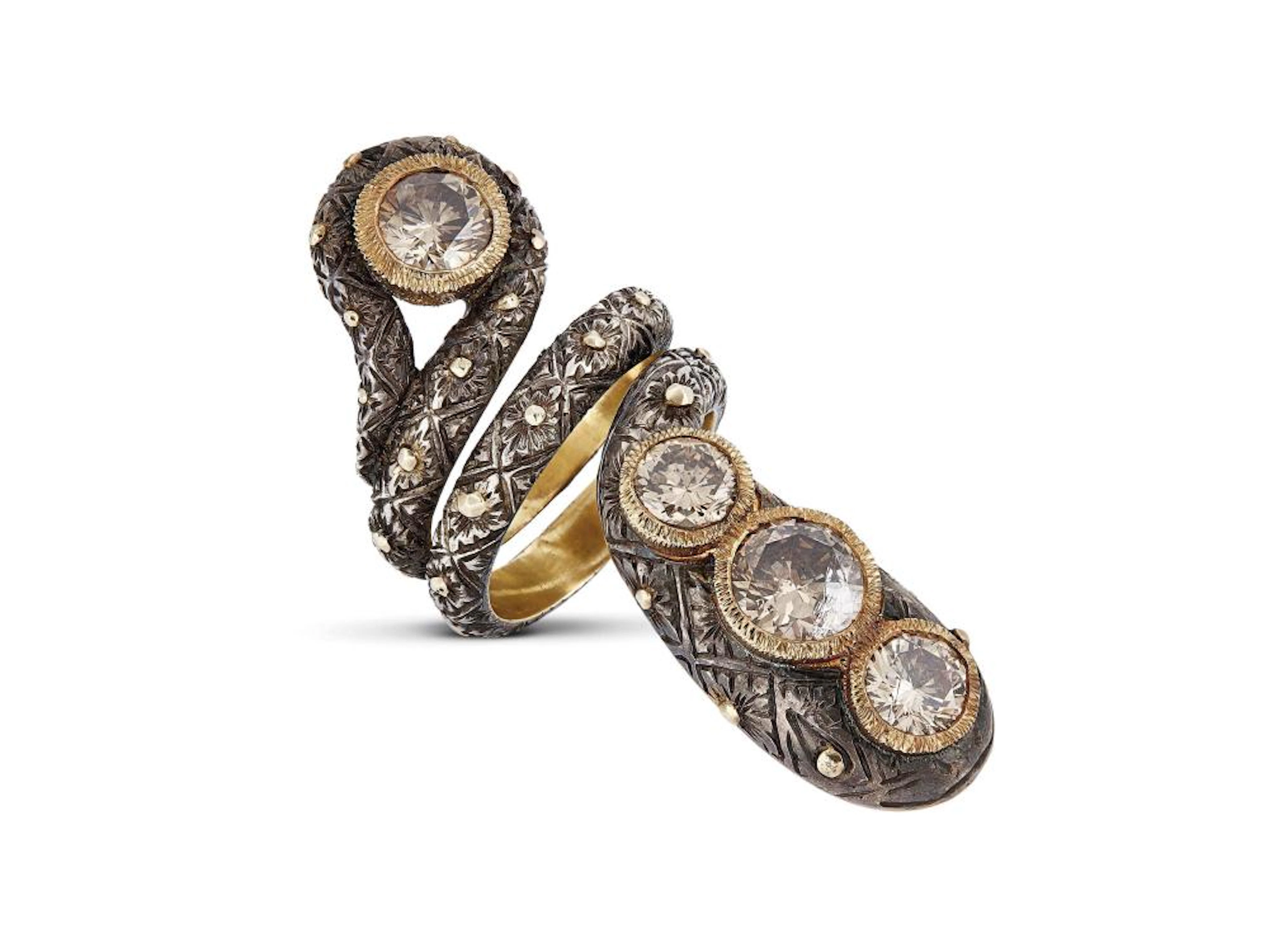 A.CODOGNATO ANELLO SERPENTE IN ORO GIALLO E ARGENTO CON DIAMANTI a forma