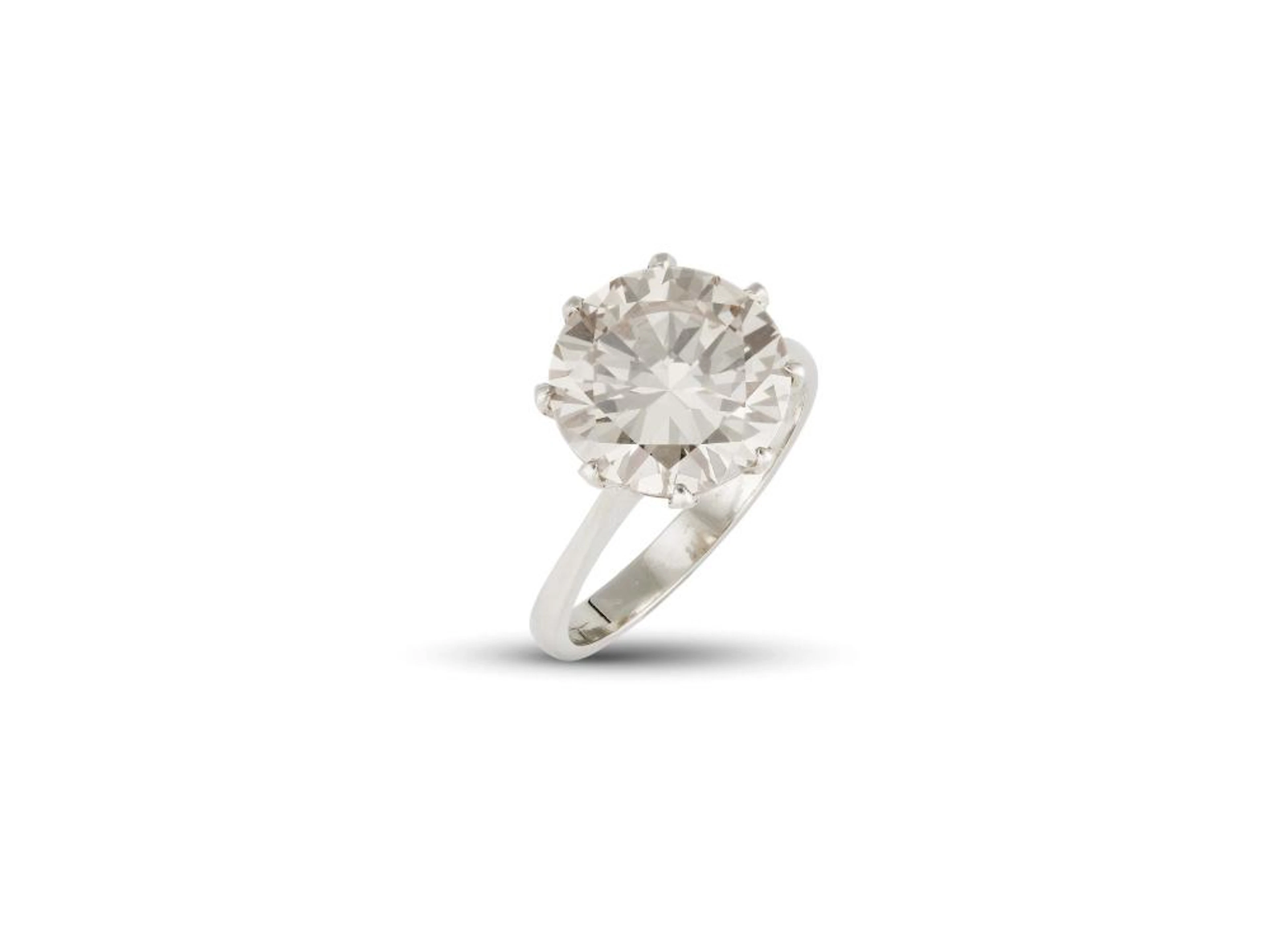 ANELLO SOLITARIO IN ORO BIANCO 18KT CON DIAMANTE impreziosito sulla somm