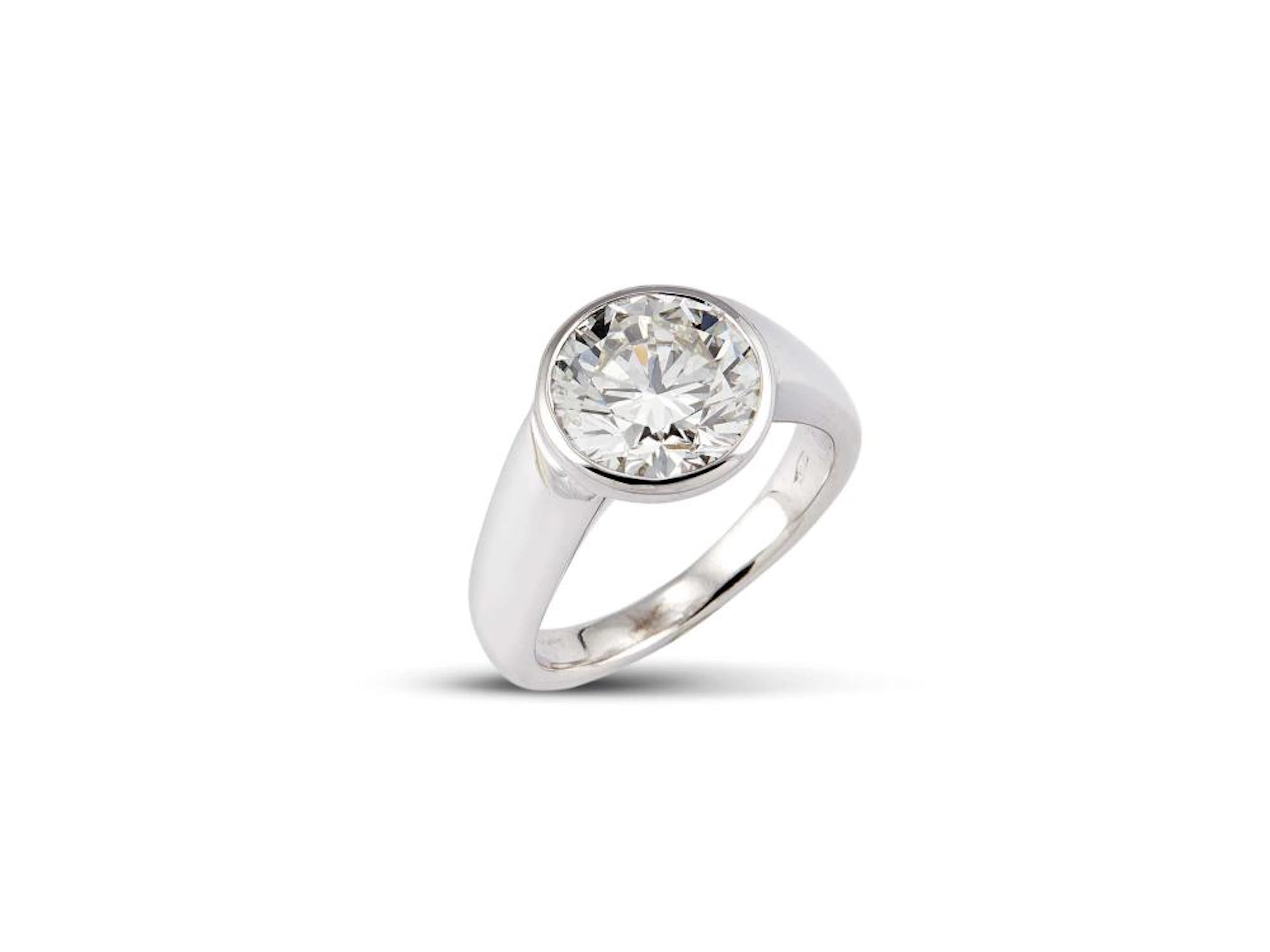 ANELLO SOLITARIO IN ORO BIANCO CON DIAMANTE impreziosito sulla sommit&ag