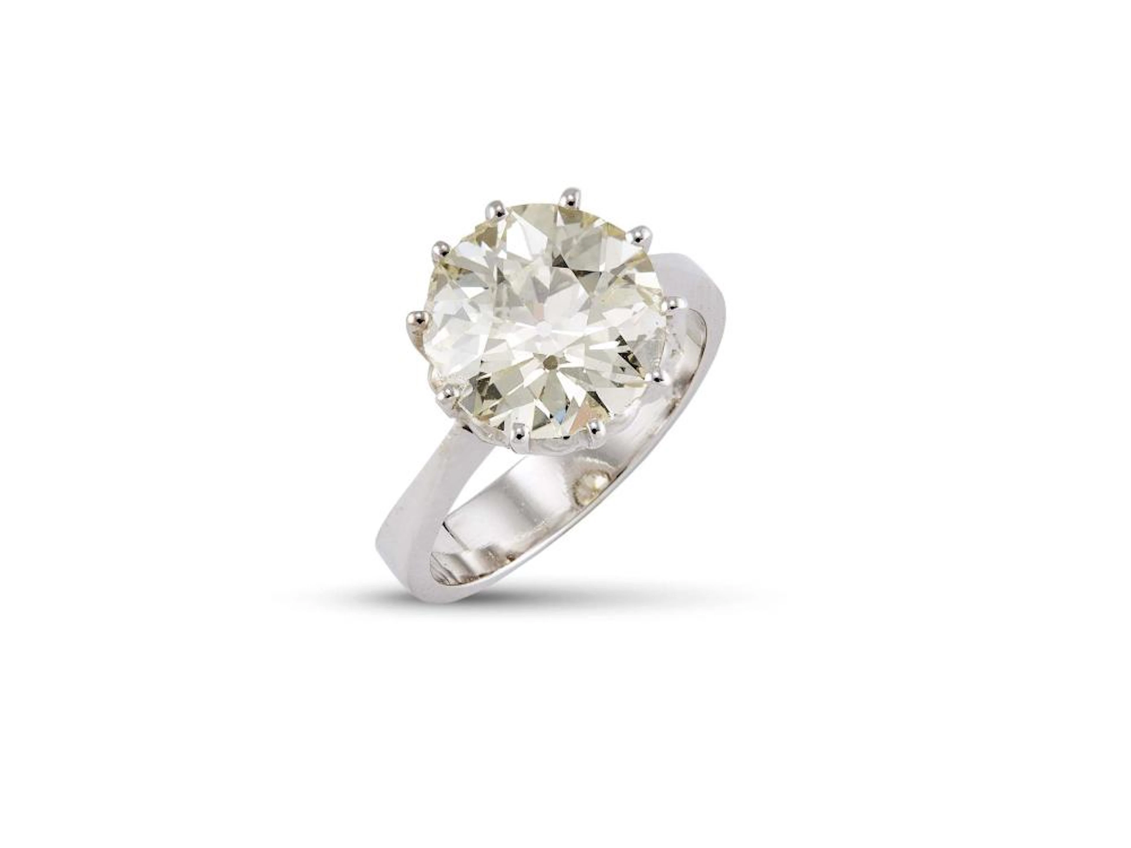 ANELLO SOLITARIO IN ORO BIANCO CON DIAMANTE impreziosito sulla sommit&ag