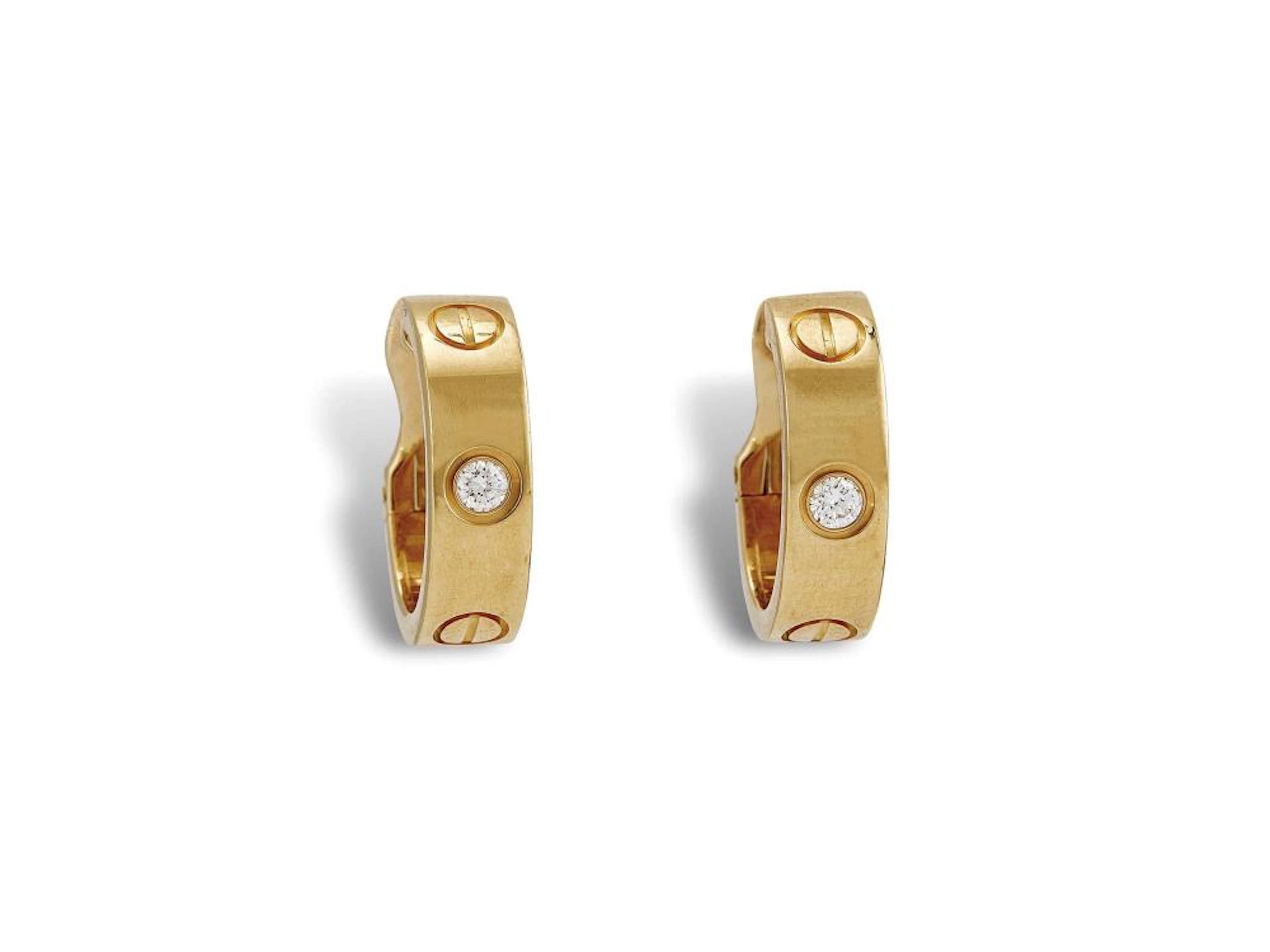 CARTIER 'LOVE' PAIO DI ORECCHINI IN ORO GIALLO impreziositi da due diama