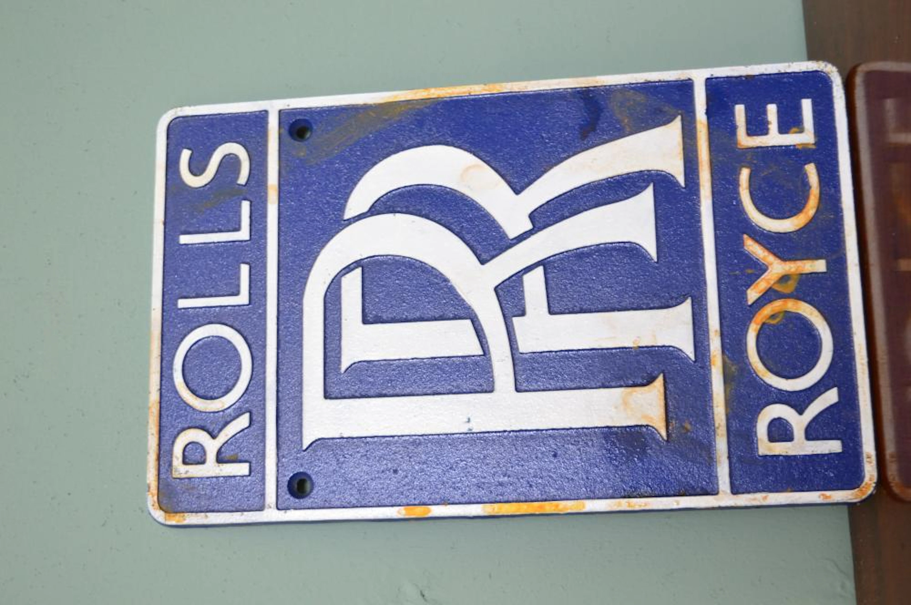 Rolls Royce cast iron advertising sign.