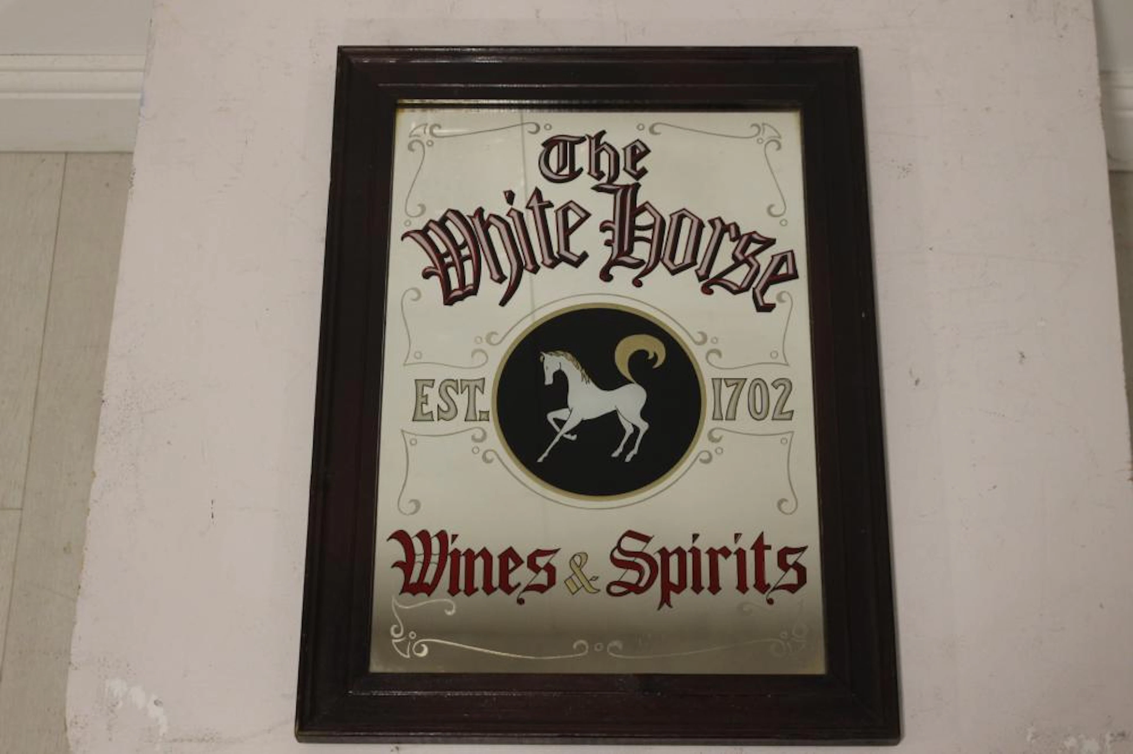 The White Horse advertising mirror.