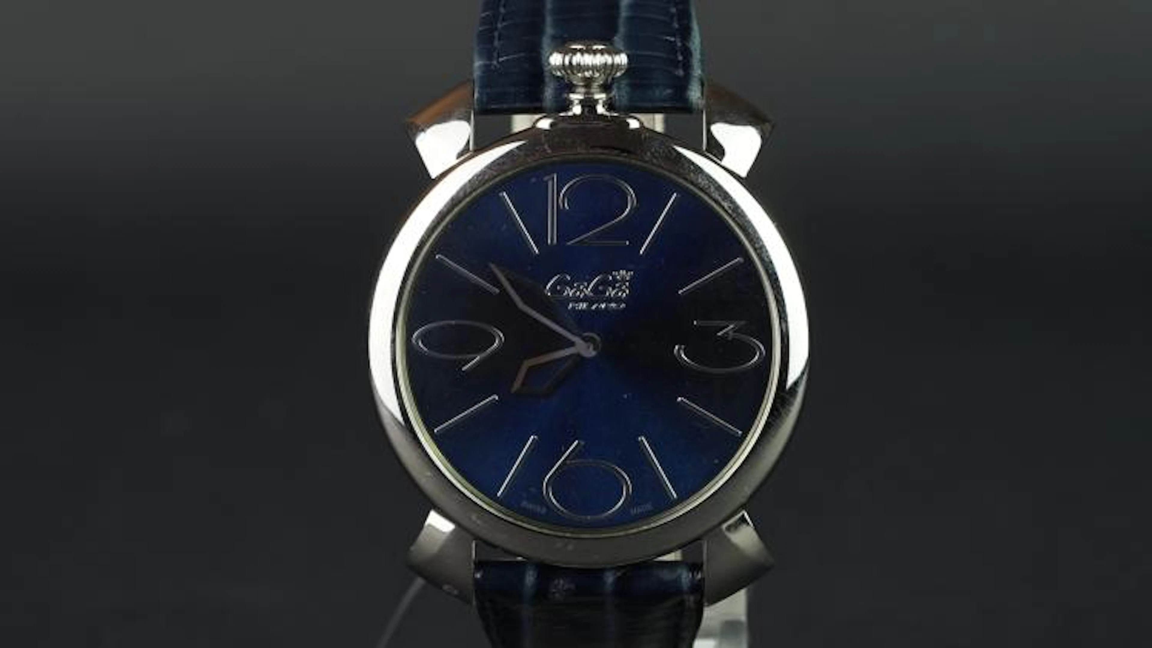 GENTLEMEN'S GAGA MILANO WRISTWATCH, circular navy dial with Arabic numerals
