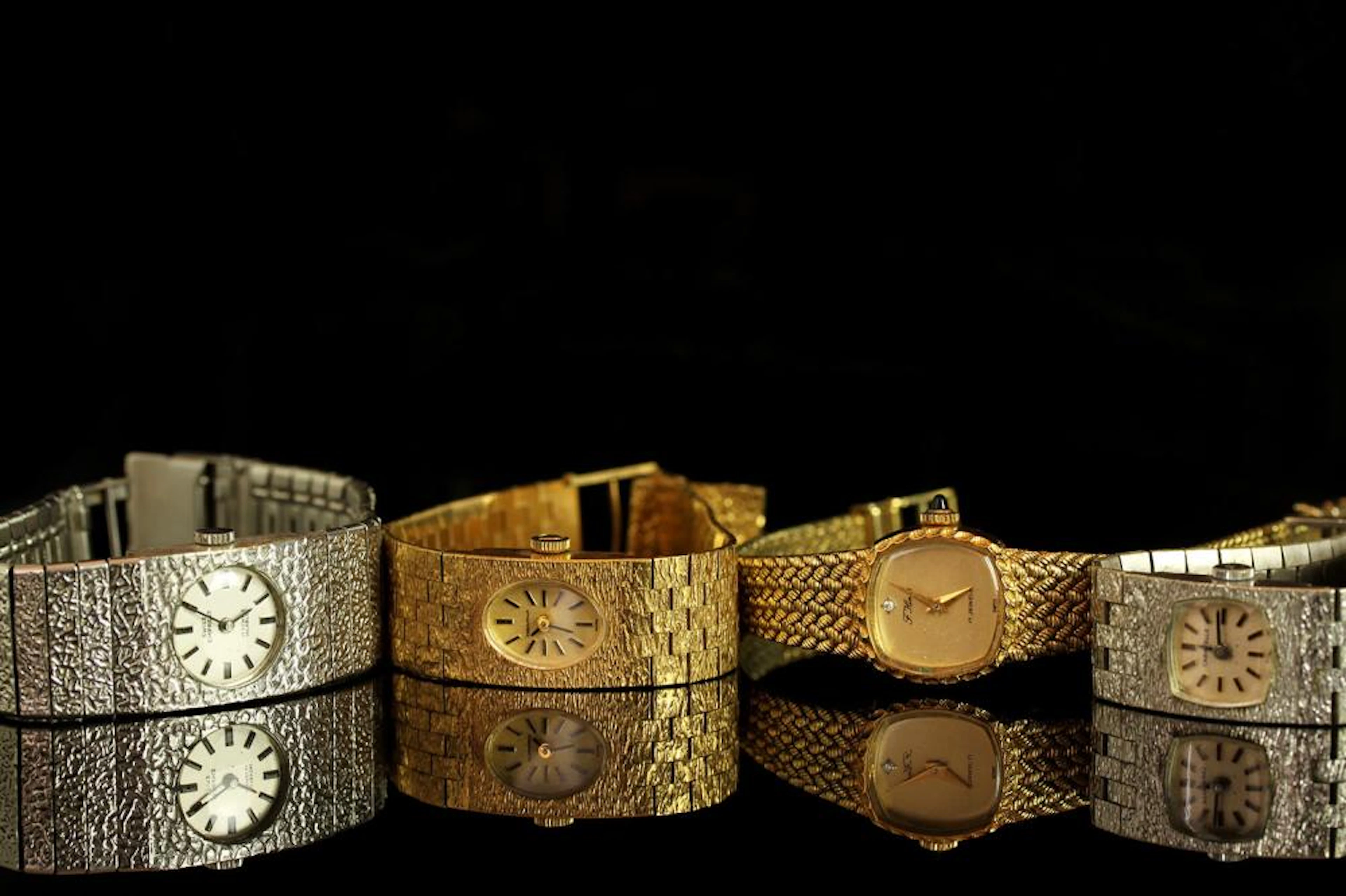 GROUP OF FOUR LADIES WATCHES INCLUDING A CARAVELLE,SWISS EMPRESS