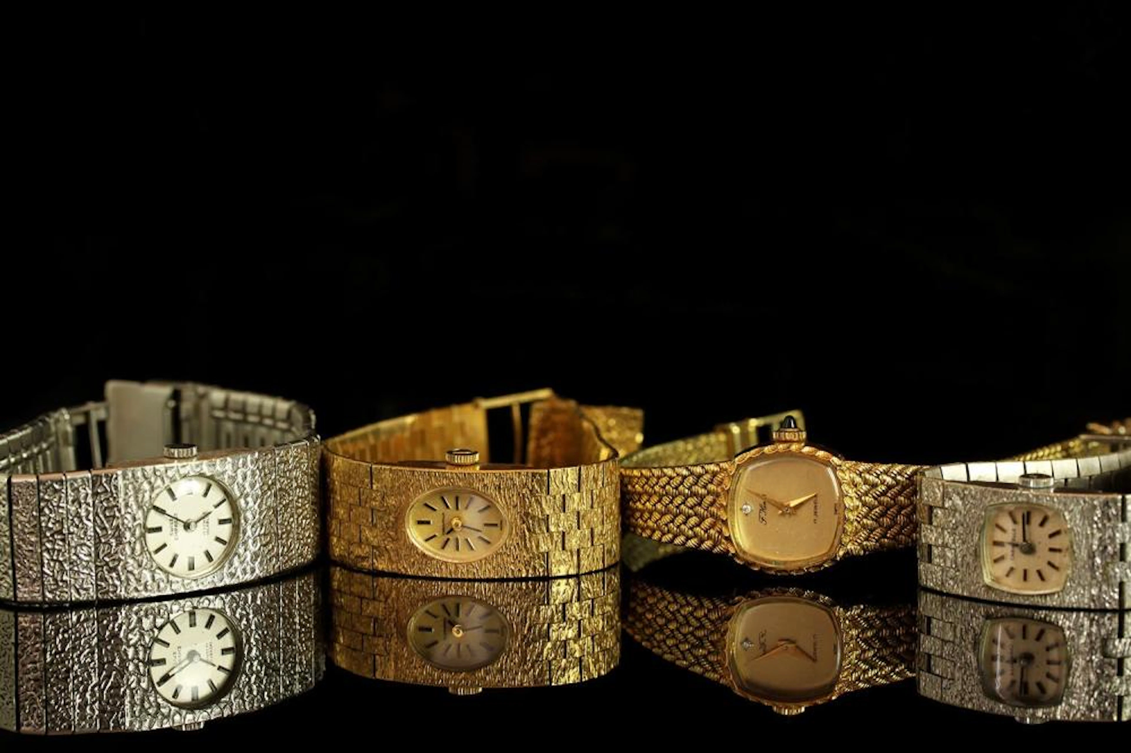 GROUP OF FOUR LADIES WATCHES INCLUDING A CARAVELLE,SWISS EMPRESS