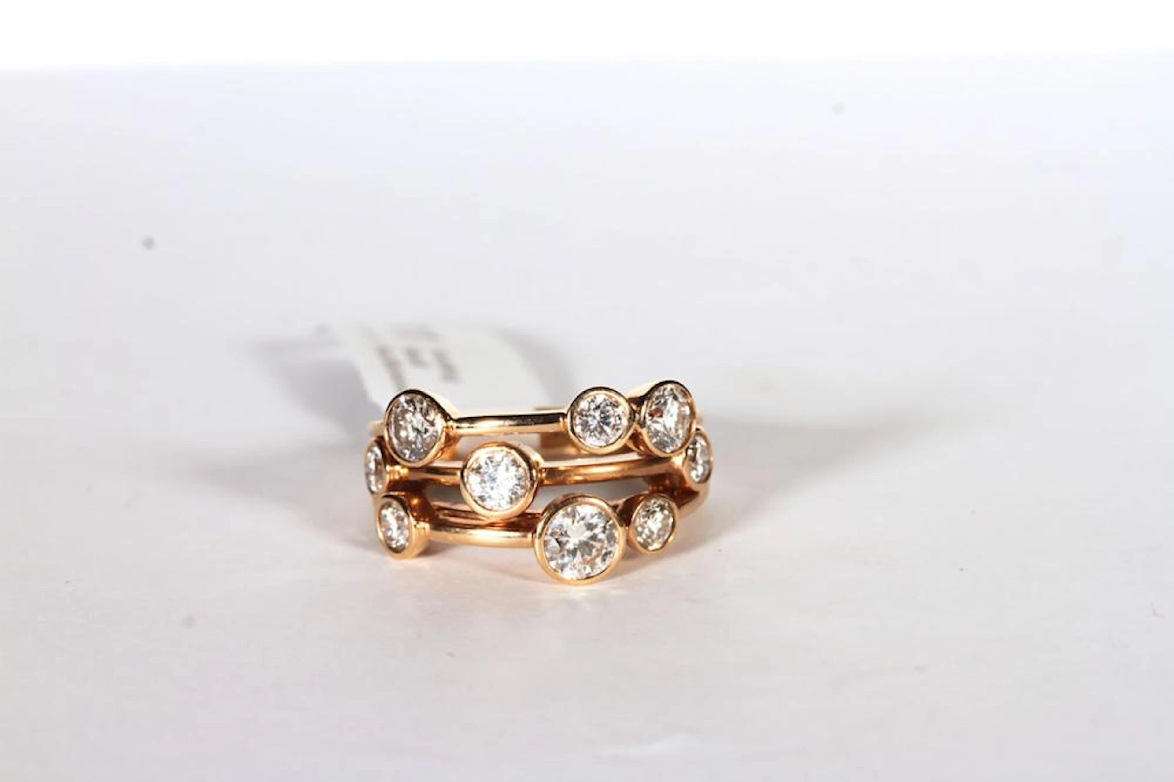 18CT CLASSIC BOODLES RAINDANCE RING SET WITH AN ESTIMATED...