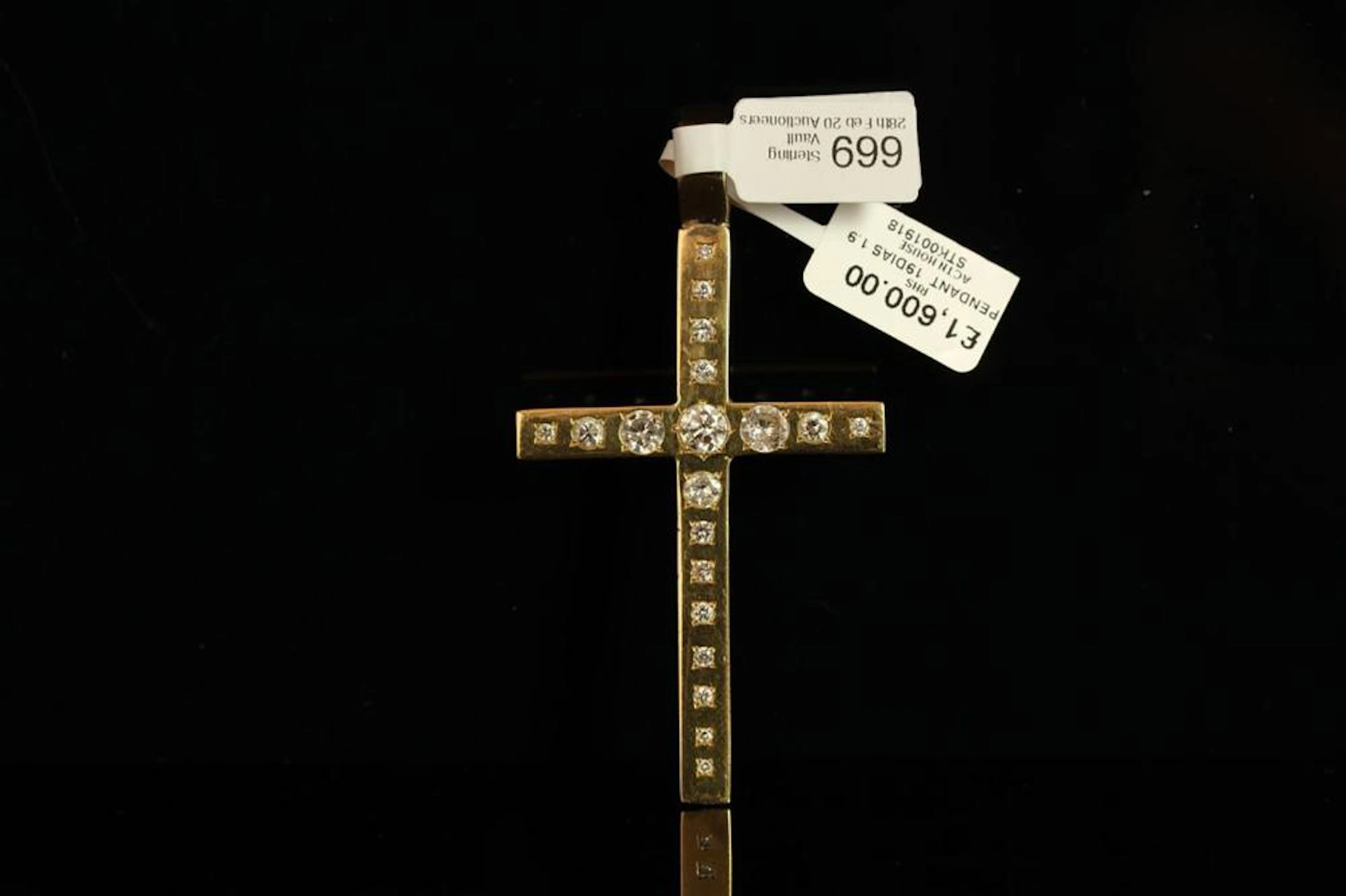 18K HEAVY CROSS SET WITH 20 BRILLIANT CUT...