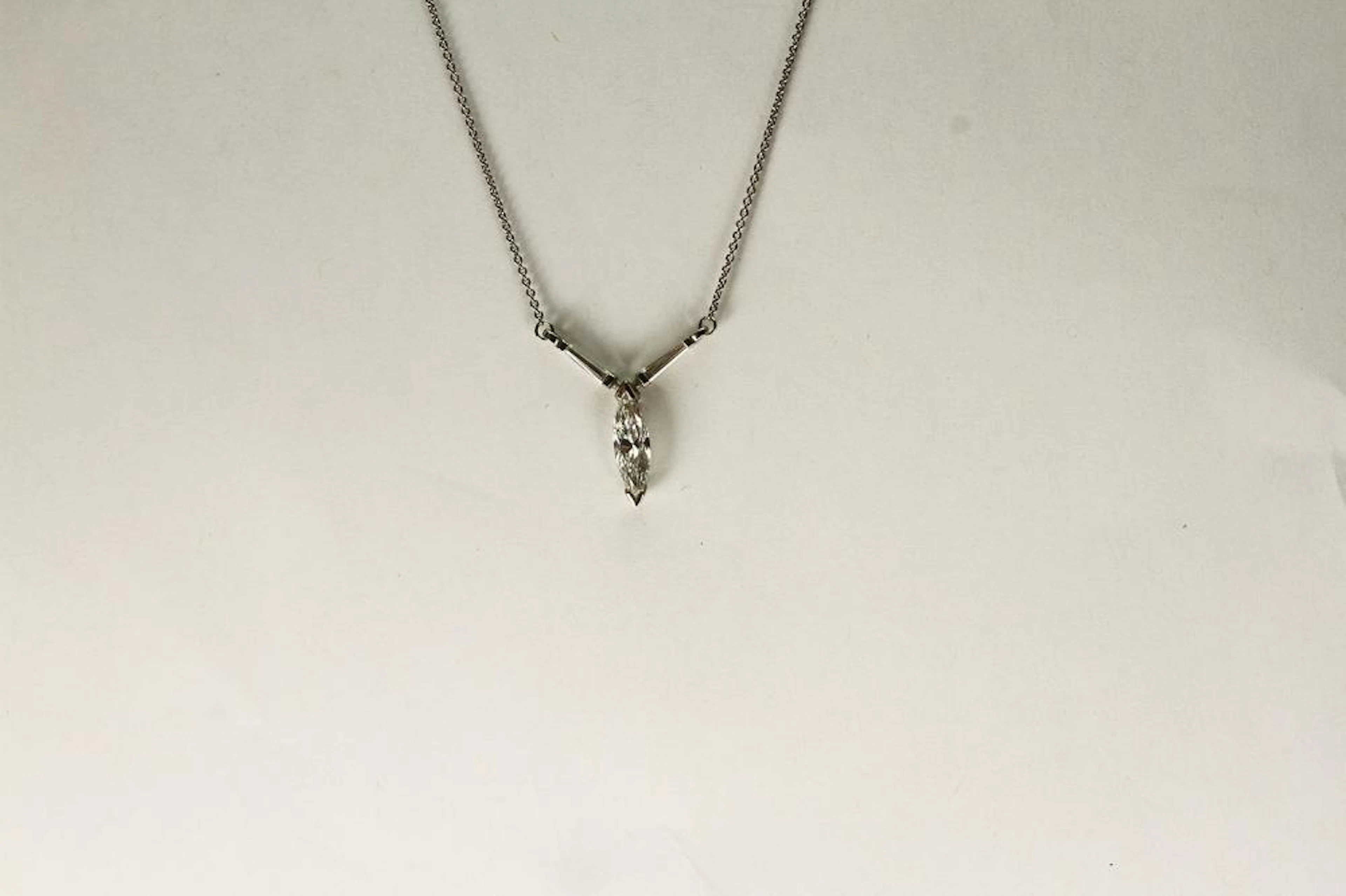 PLATINUM MARQUISE AND BAGUETTE CUT PENDANT