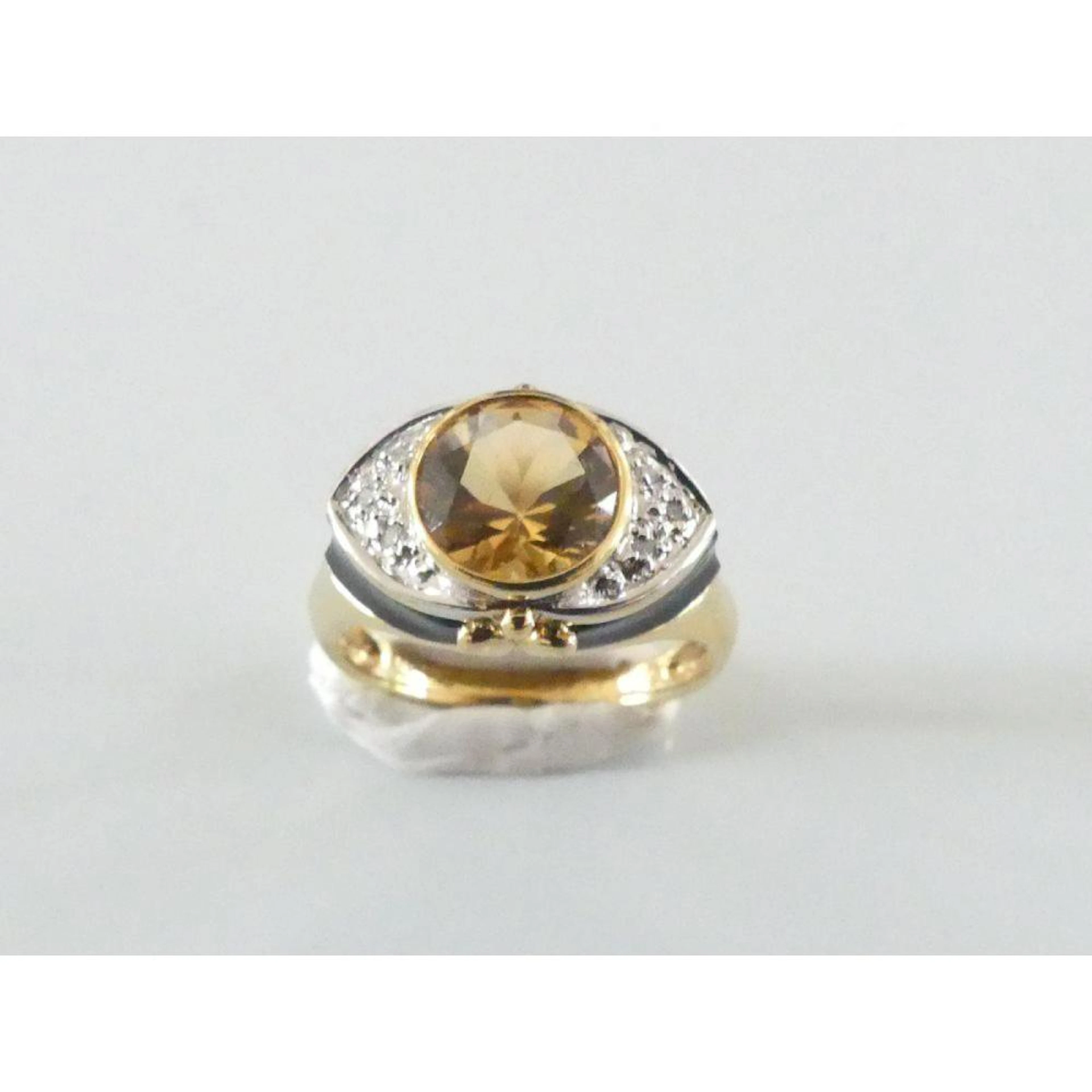 BAGUE en or jaune 750°/°° sertie clos d?une citrine de 1ct60 env